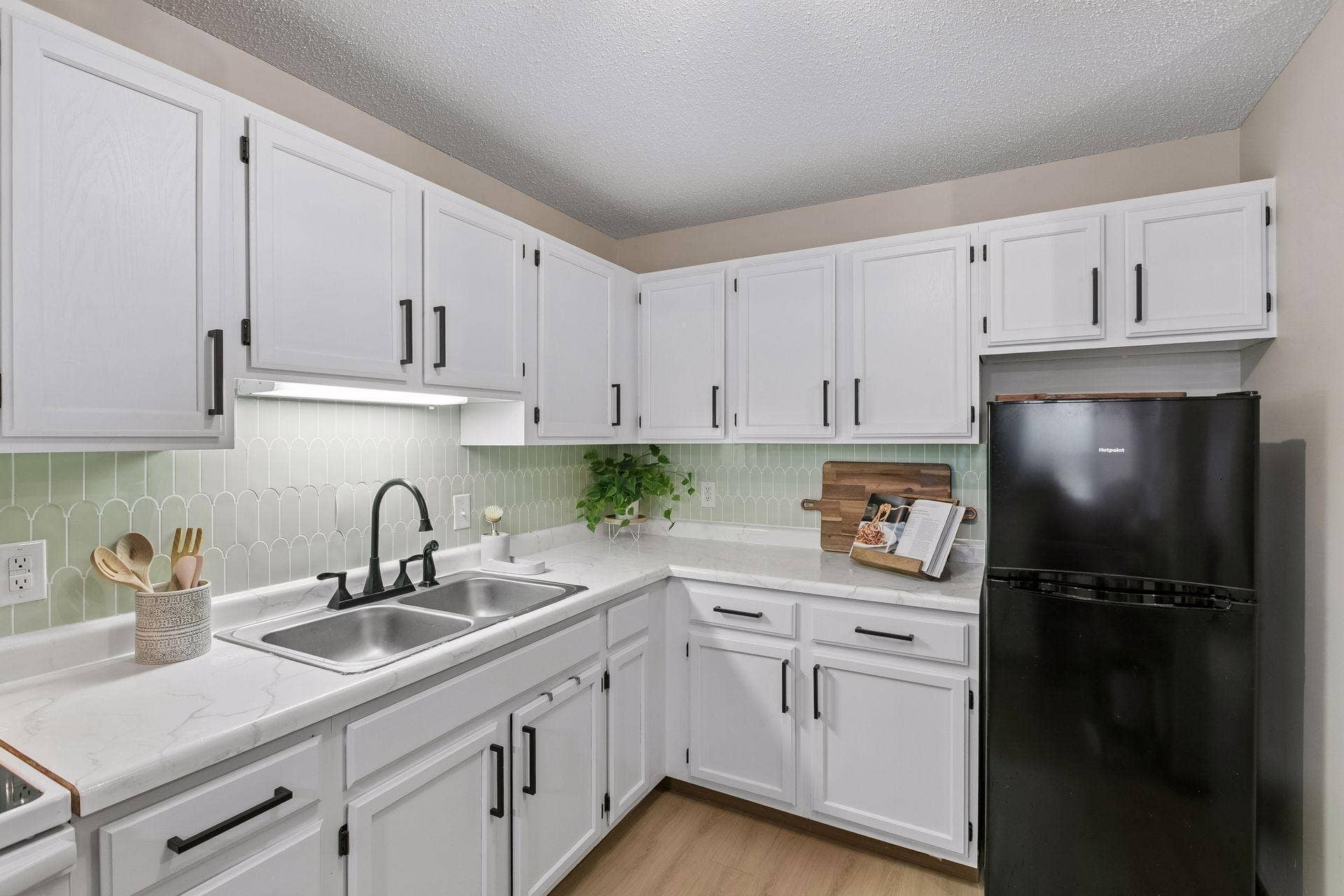 720 3rd Avenue NE, #120, 71, Minneapolis, MN 55413 Kitchen flooring, cabinets and countertops were updated in 2023. The refrigerator is only two years old.