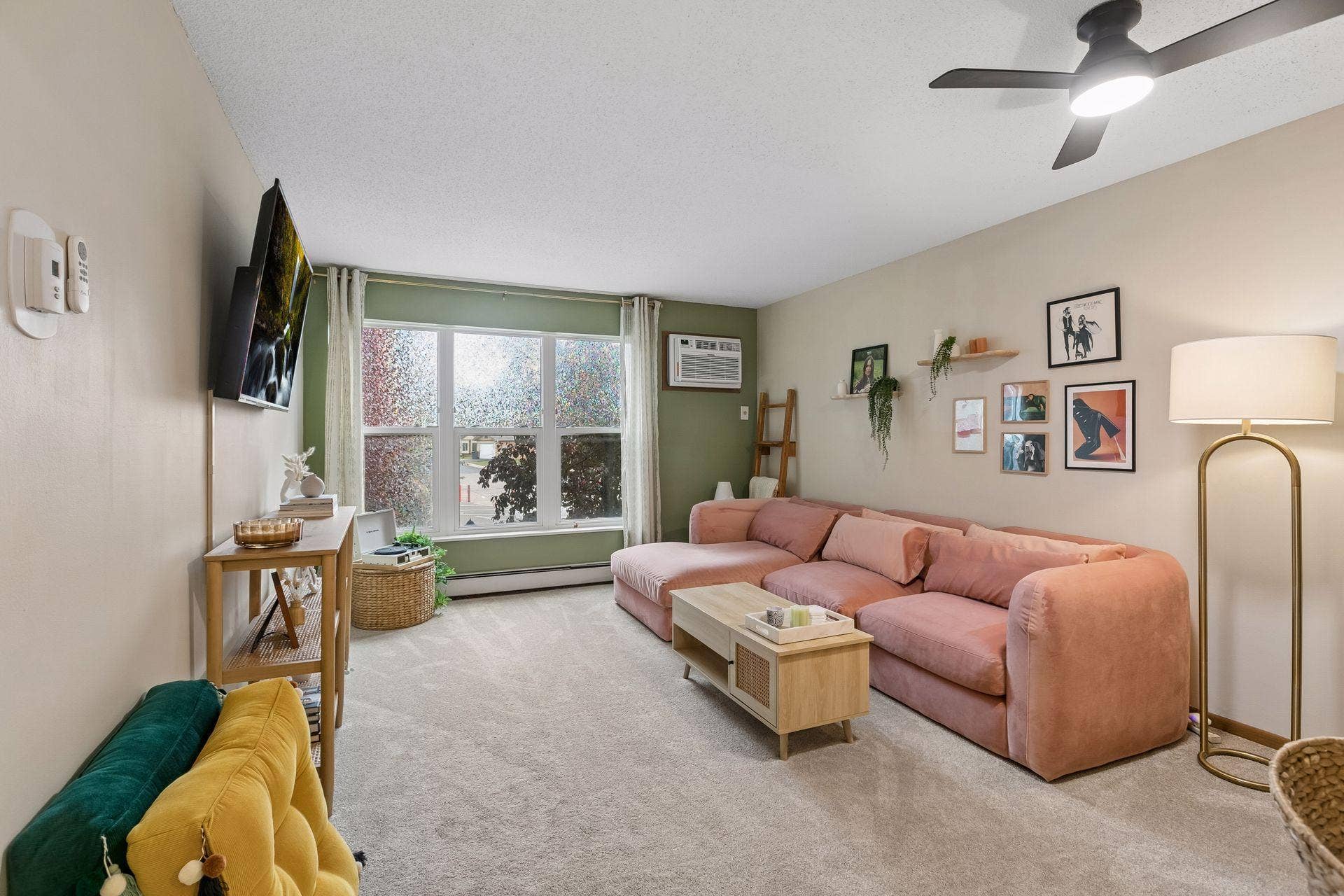 720 3rd Avenue NE, #120, 71, Minneapolis, MN 55413 Your spacious living room with recent carpet and paint updates.