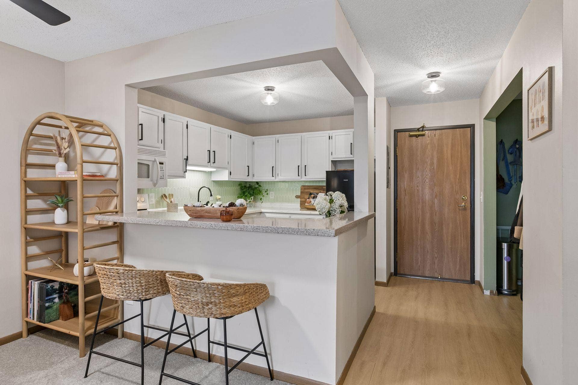 720 3rd Avenue NE, #120, 71, Minneapolis, MN 55413 #120 has an open kitchen and ample hall closet for storage.
