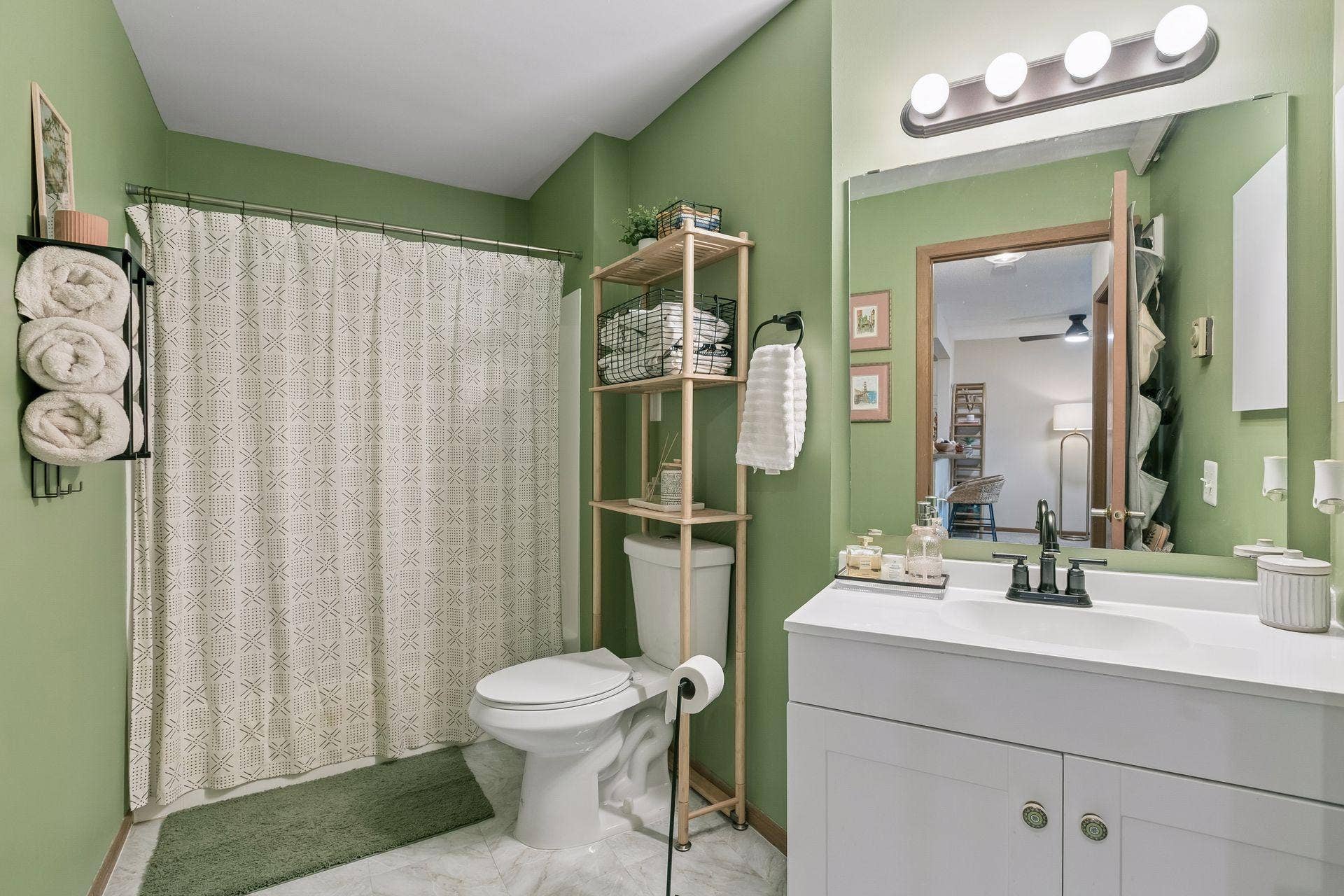 720 3rd Avenue NE, #120, 71, Minneapolis, MN 55413 The freshly painted full-bath. The tub was reglazed and new fixtures were installed in 2023.