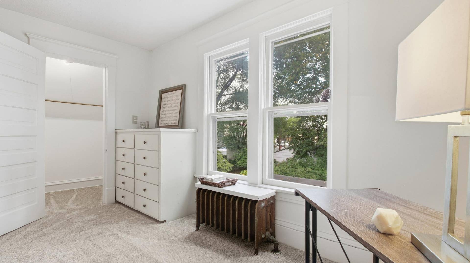 820 5th Avenue SE, 50, Minneapolis, MN 55414 Bedroom 3 on the upper level has a built-in dresser and a 7x4 walk-in closet.