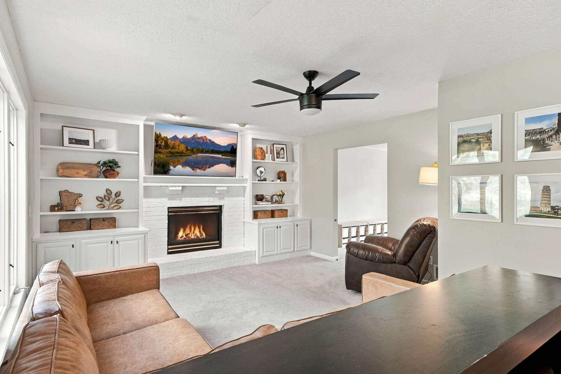 Built-in bookshelves and a gas fireplace make for a great spot to spend a relaxing evening.