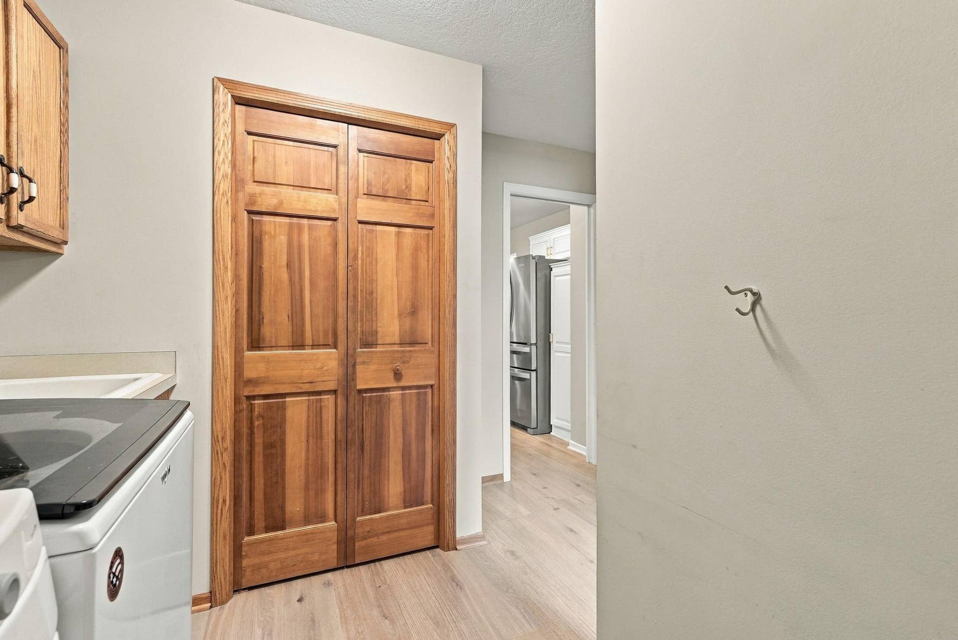 The main level laundry room is just off the garage and includes a coat closet.