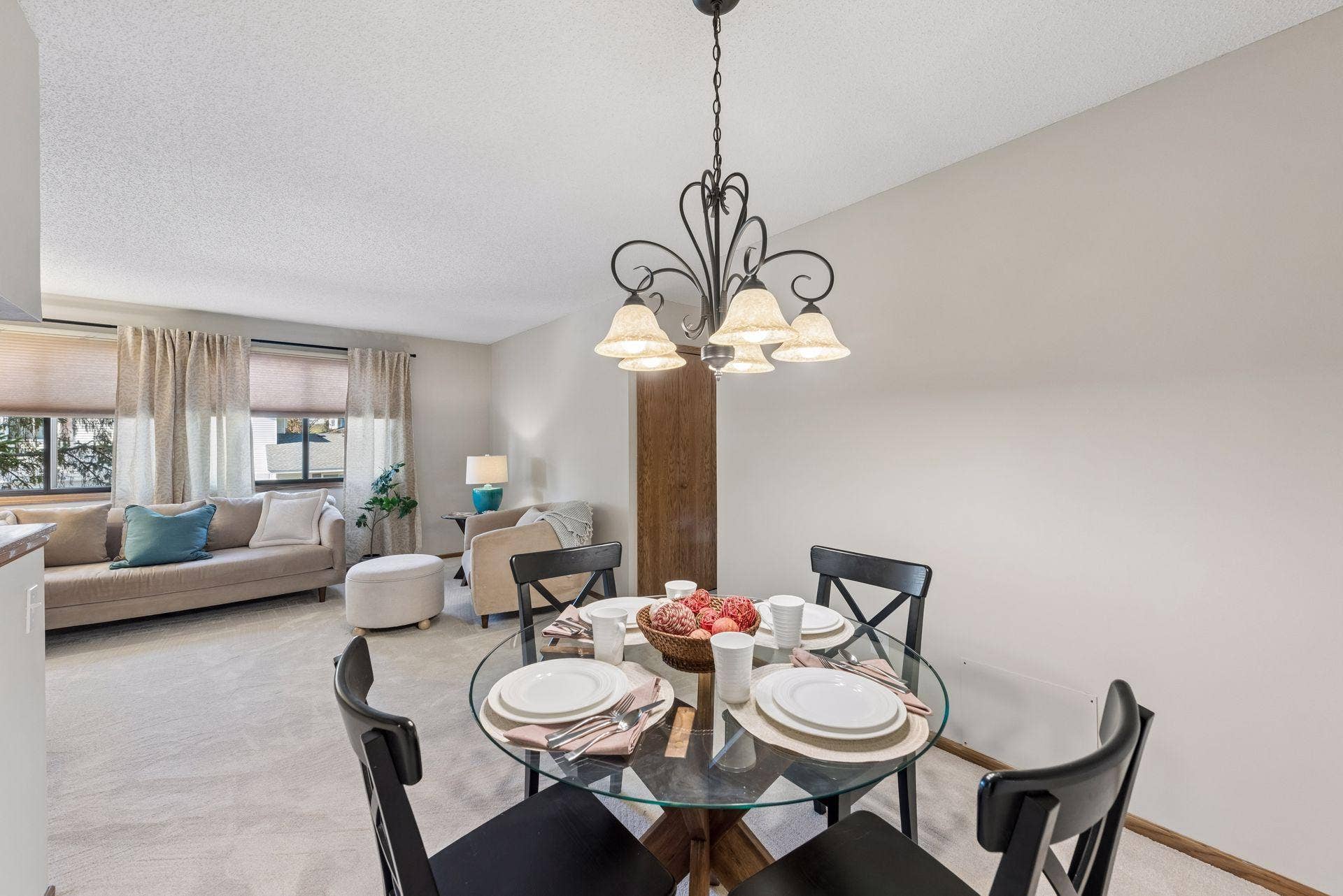 7638 13th Street N, Oakdale, MN 55128 Let the conversation linger after dinnerthe dining area opens directly into the inviting living room, keeping gatherings comfortably connected.