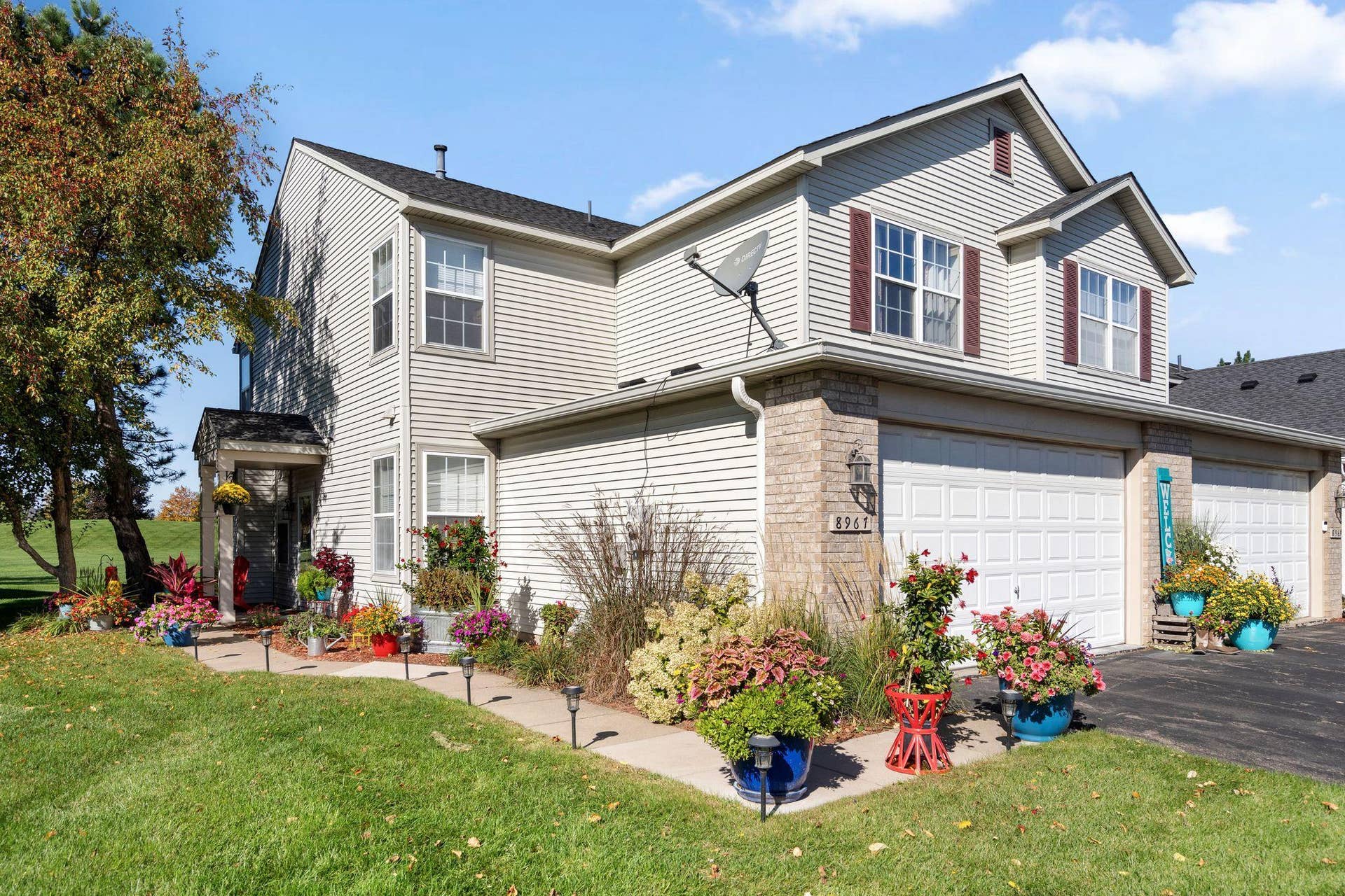 8967 Comstock Lane N, Maple Grove, MN 55311 8967 Comstock Lane N- You will know it's the house becasue of the beautiful flowers outside!