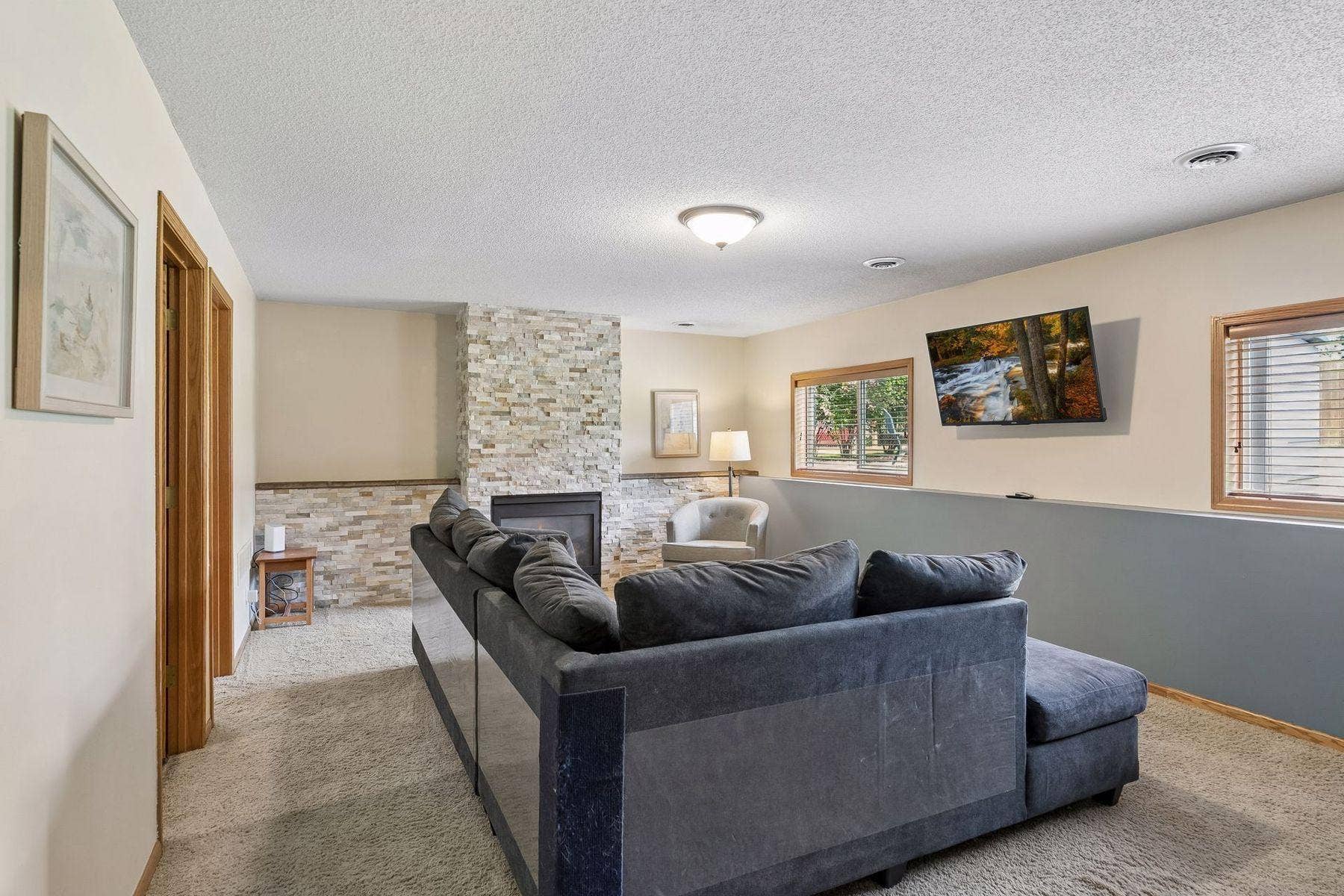 1049 Bonnieview Drive, Woodbury, MN 55129 Enjoy family gatherings in the lower level family room