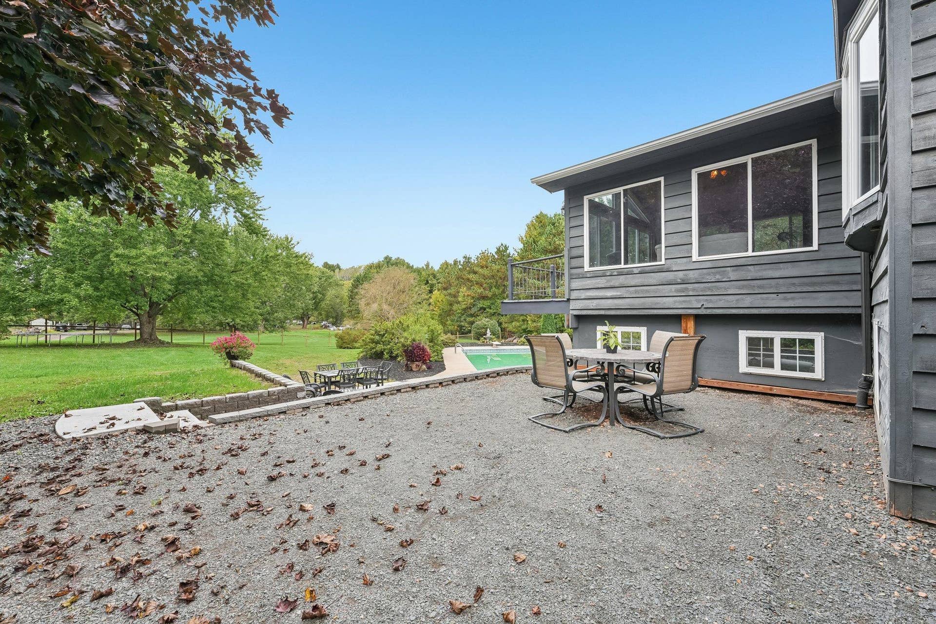 1252 Rolling Hills Trail, Hudson, WI 54016 Upper patio with steps to lower patio and pool