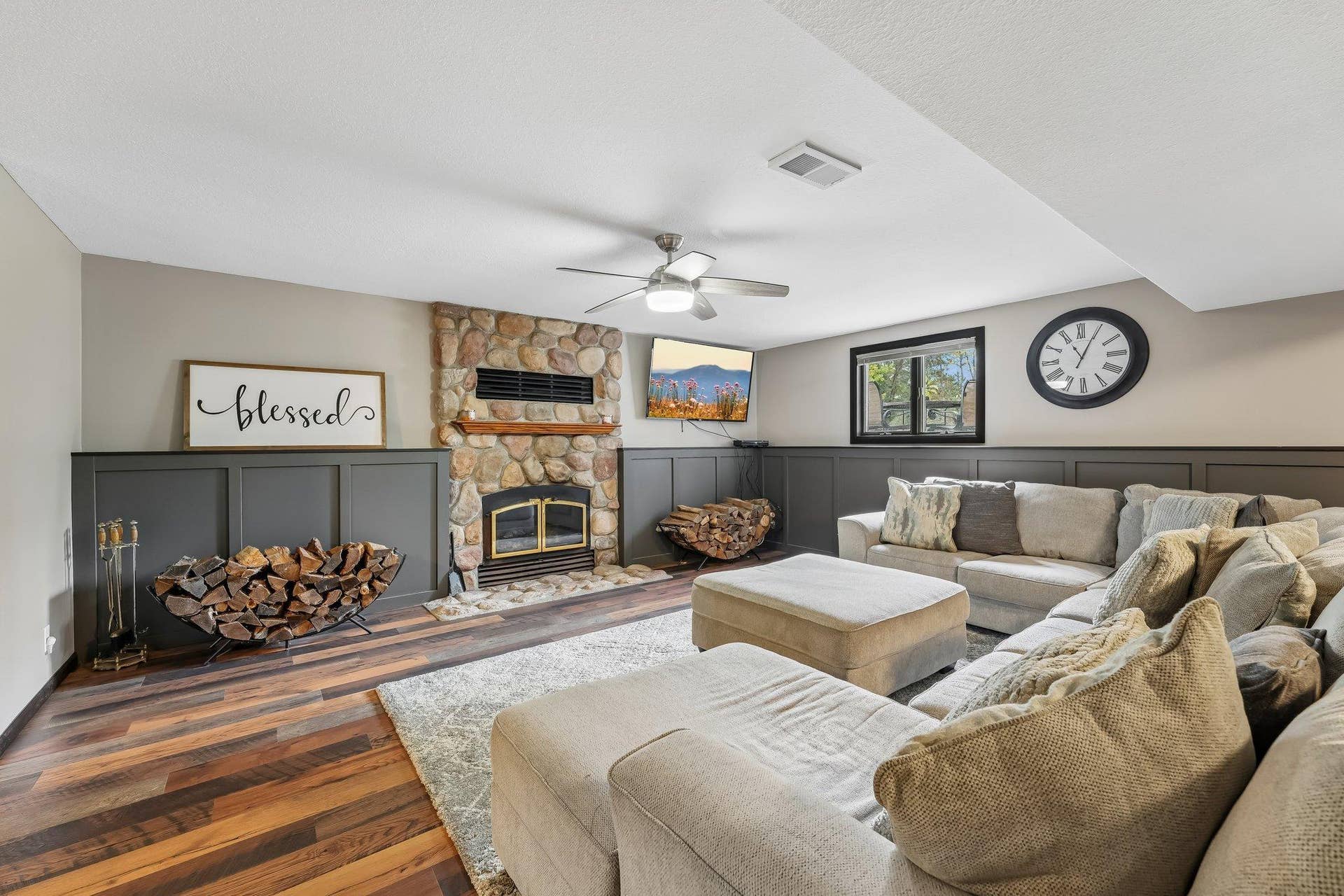 1252 Rolling Hills Trail, Hudson, WI 54016 Lower level family room with wood fireplace and walkout to covered patio