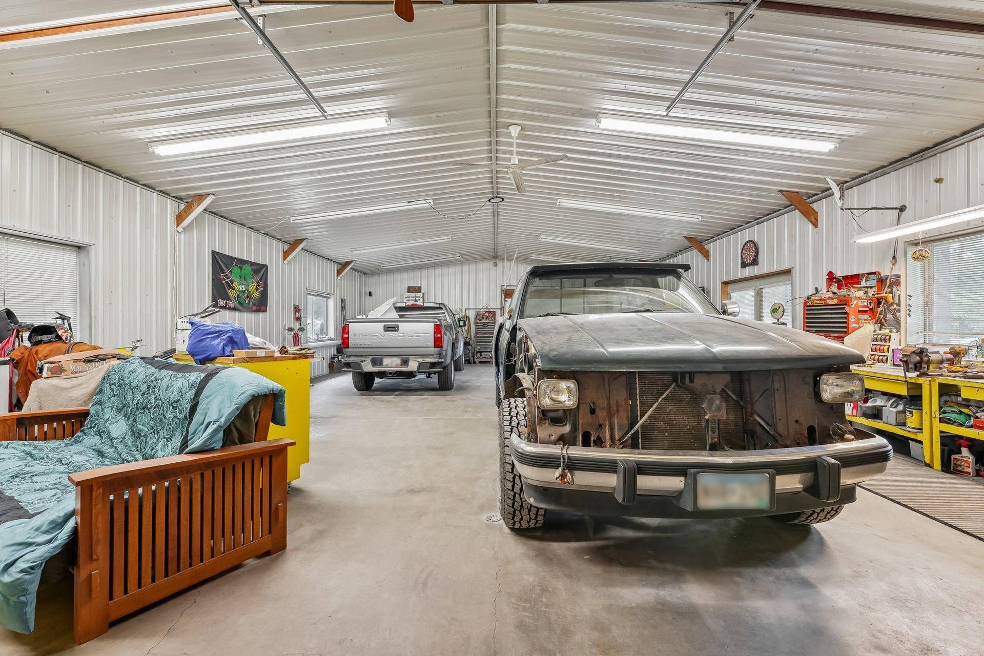 1252 Rolling Hills Trail, Hudson, WI 54016 44' x 30 Insulated heated shop of the 30 x 99 pole shed with patio door leading to covered patio and windows