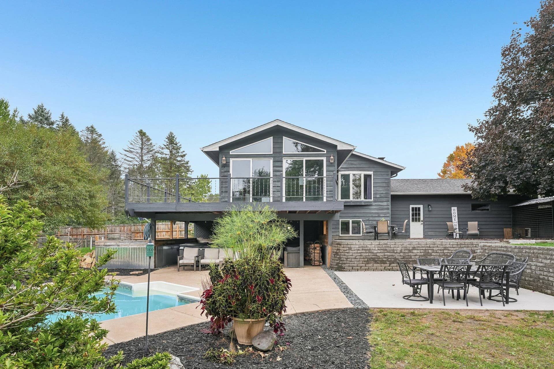 1252 Rolling Hills Trail, Hudson, WI 54016 Inground pool and covered lower level porch