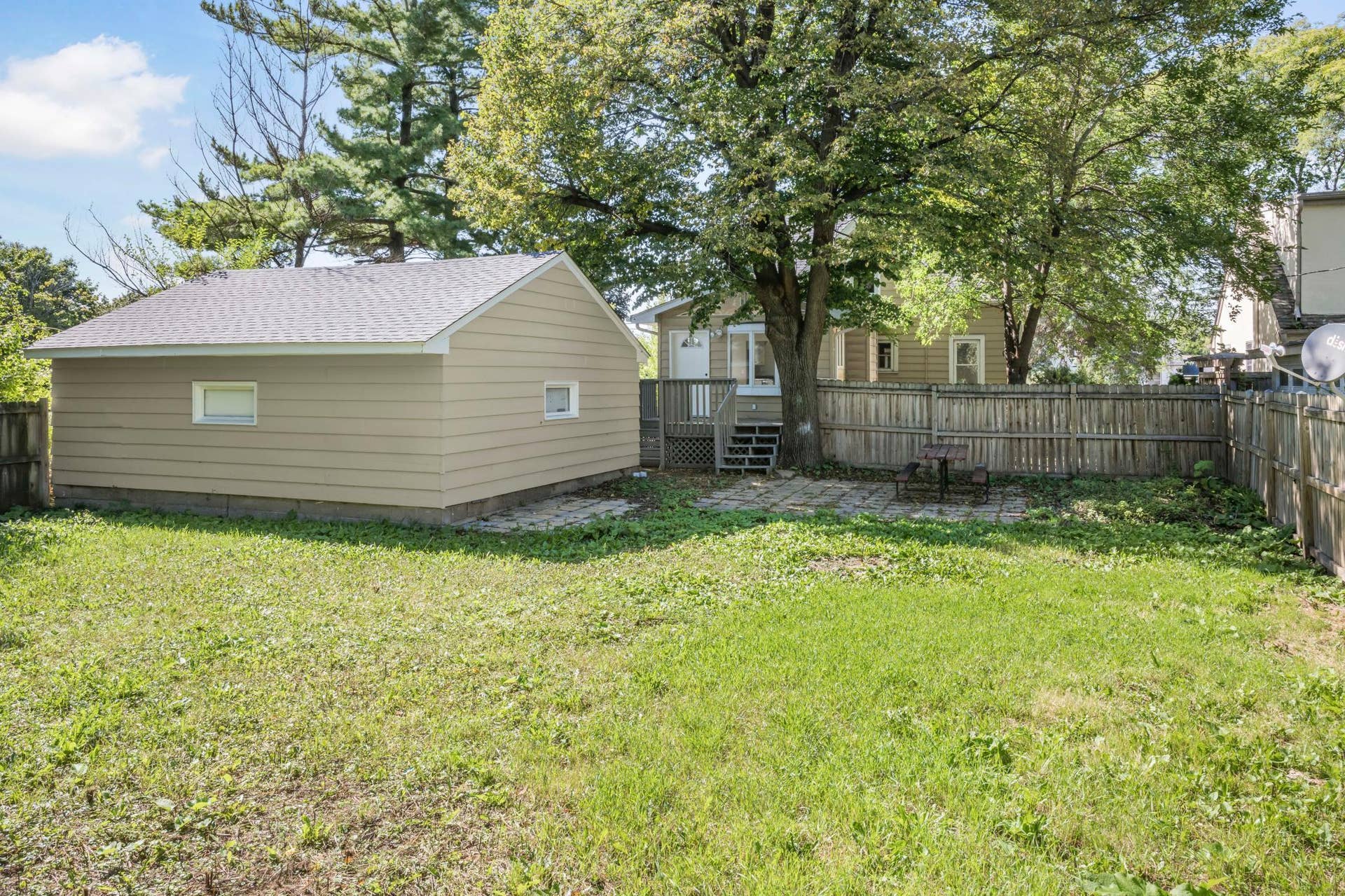 756 Mcknight Road N, Maplewood, MN 55119 Another view of about 1/2 the backyard and large 2 car garage