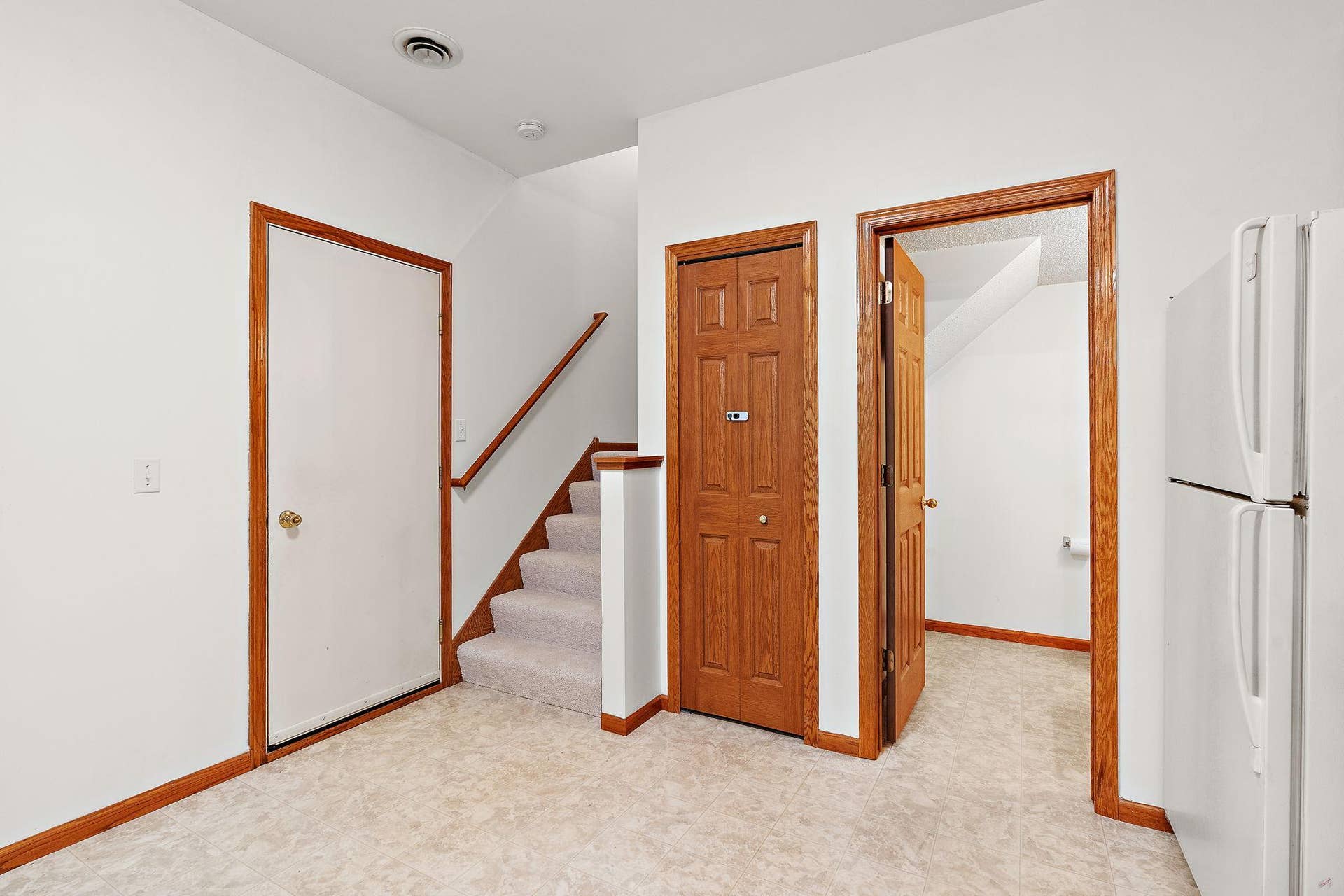 18034 69th Place N, Maple Grove, MN 55311 Kitchen to 1/2 bath and garage
