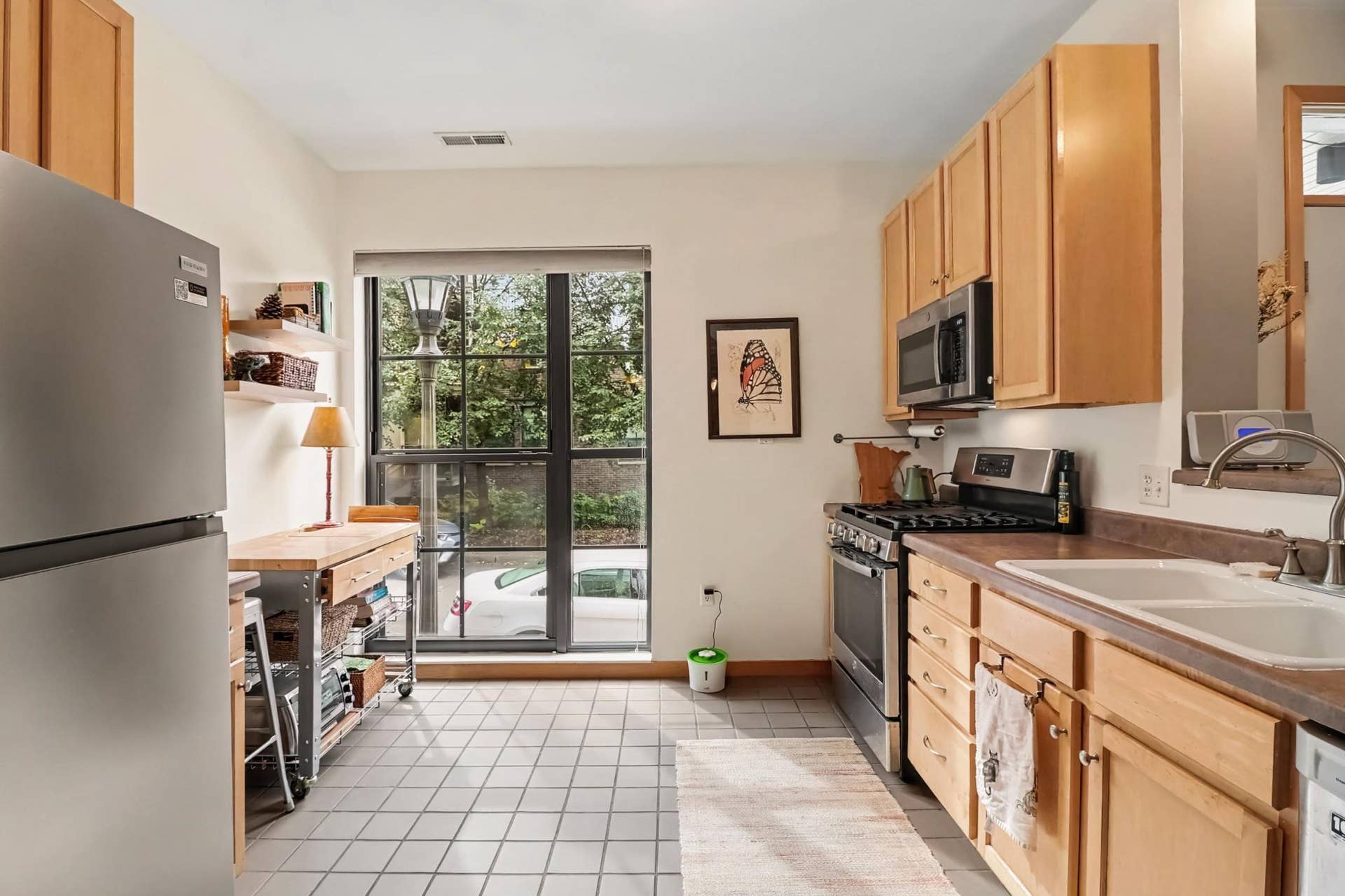 Kitchen with brand new refrigerator- option for stone counters