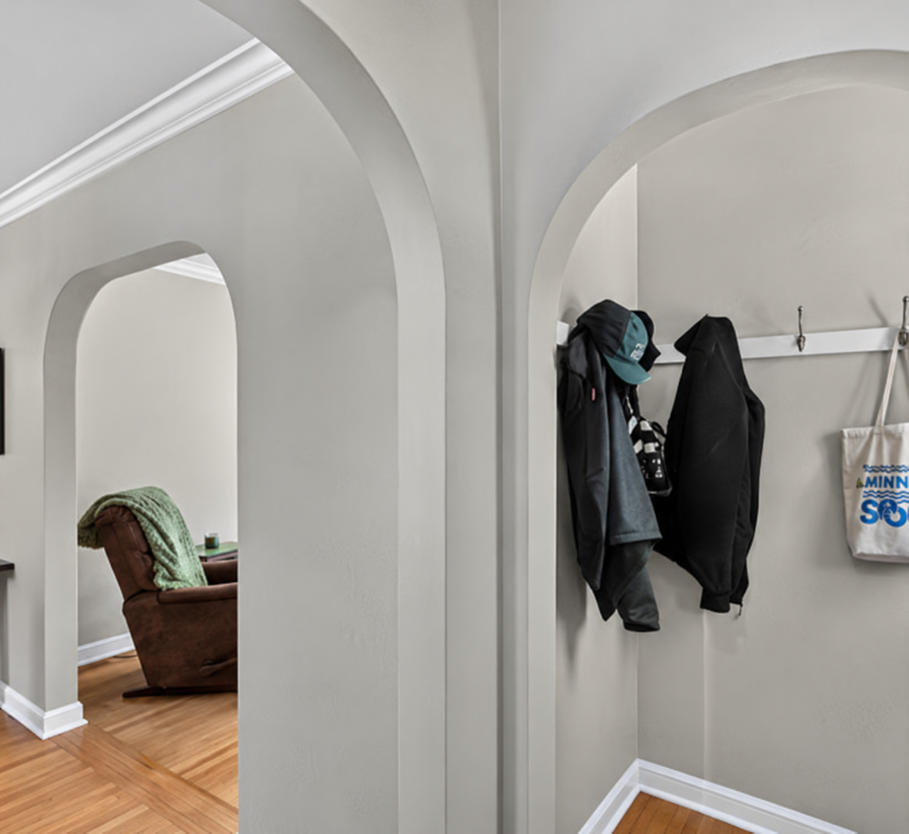 715 Maple Street, Alexandria, MN 56308 Arched Hallway with Coat Nook.png