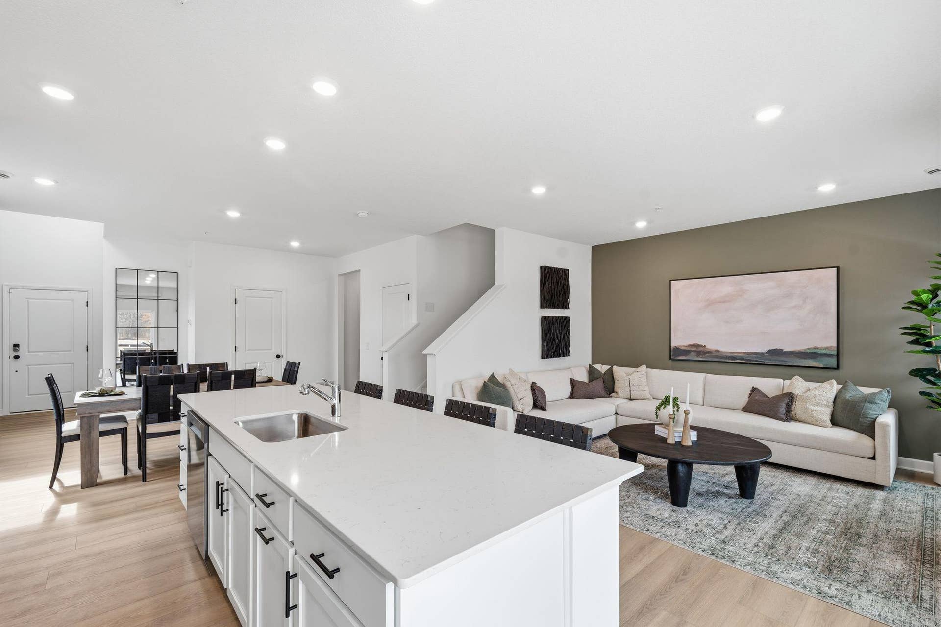 4004 Hayward Avenue N, Oakdale, MN 55128 The multifunctional center island features an undermount stainless steel sink and a multi-cycle dishwasher