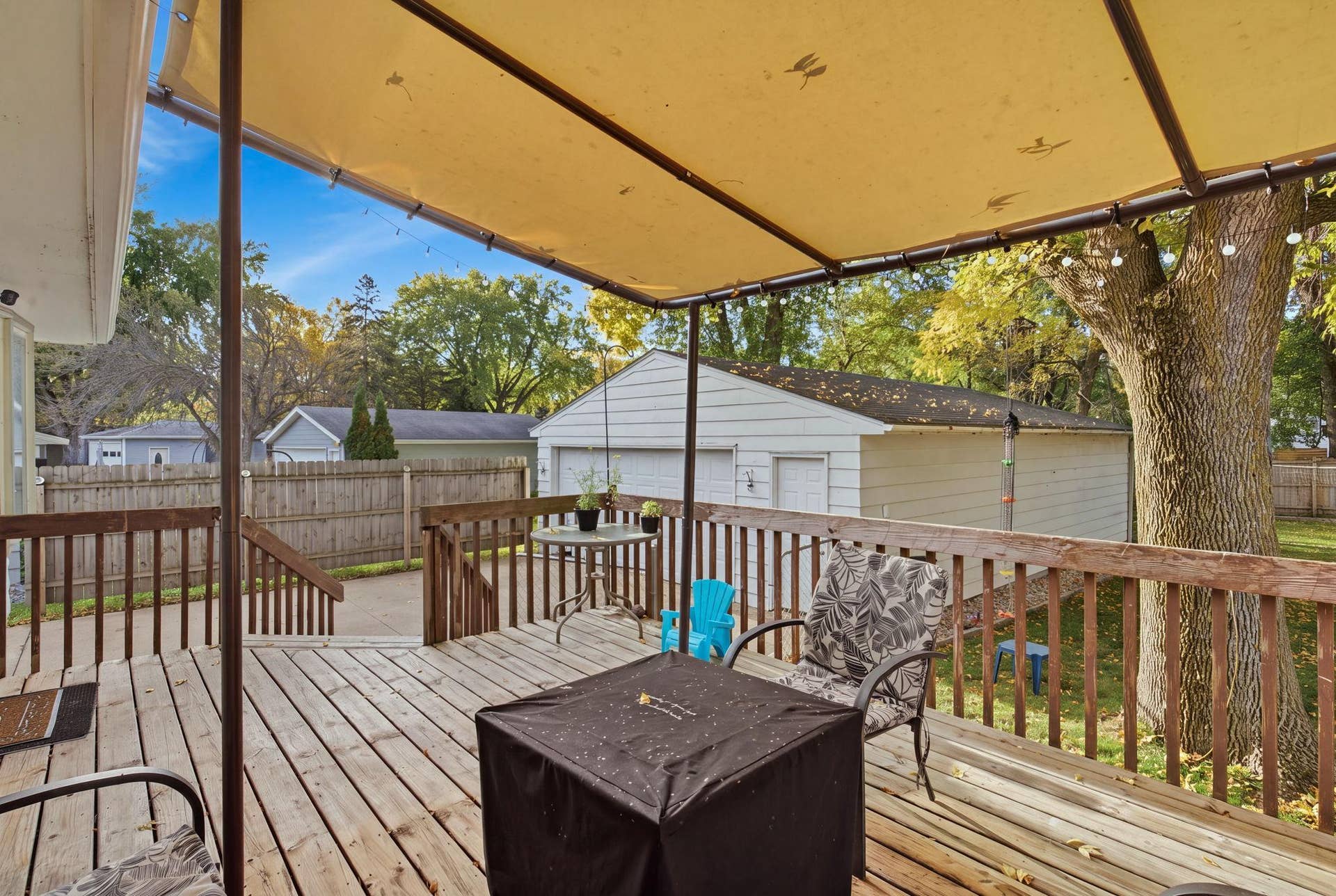 1221 13th Avenue SW, Willmar, MN 56201 1221- Deck overlooking backyard and detached garage