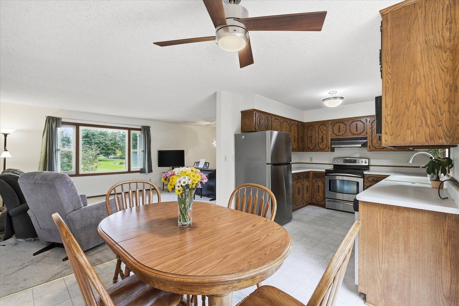 20761 187th Avenue NW, Big Lake, MN 55309 Open kitchen and dining area flows easily into the living room, creating a functional layout for everyday living and entertaining.