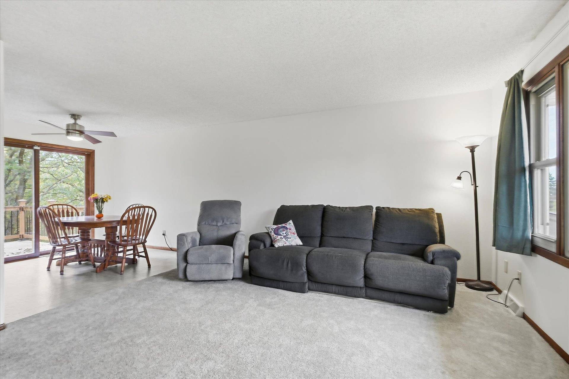 20761 187th Avenue NW, Big Lake, MN 55309 Open living and dining areas offer an easy flow for everyday living and entertaining, complemented by new carpet and access to the backyard deck.