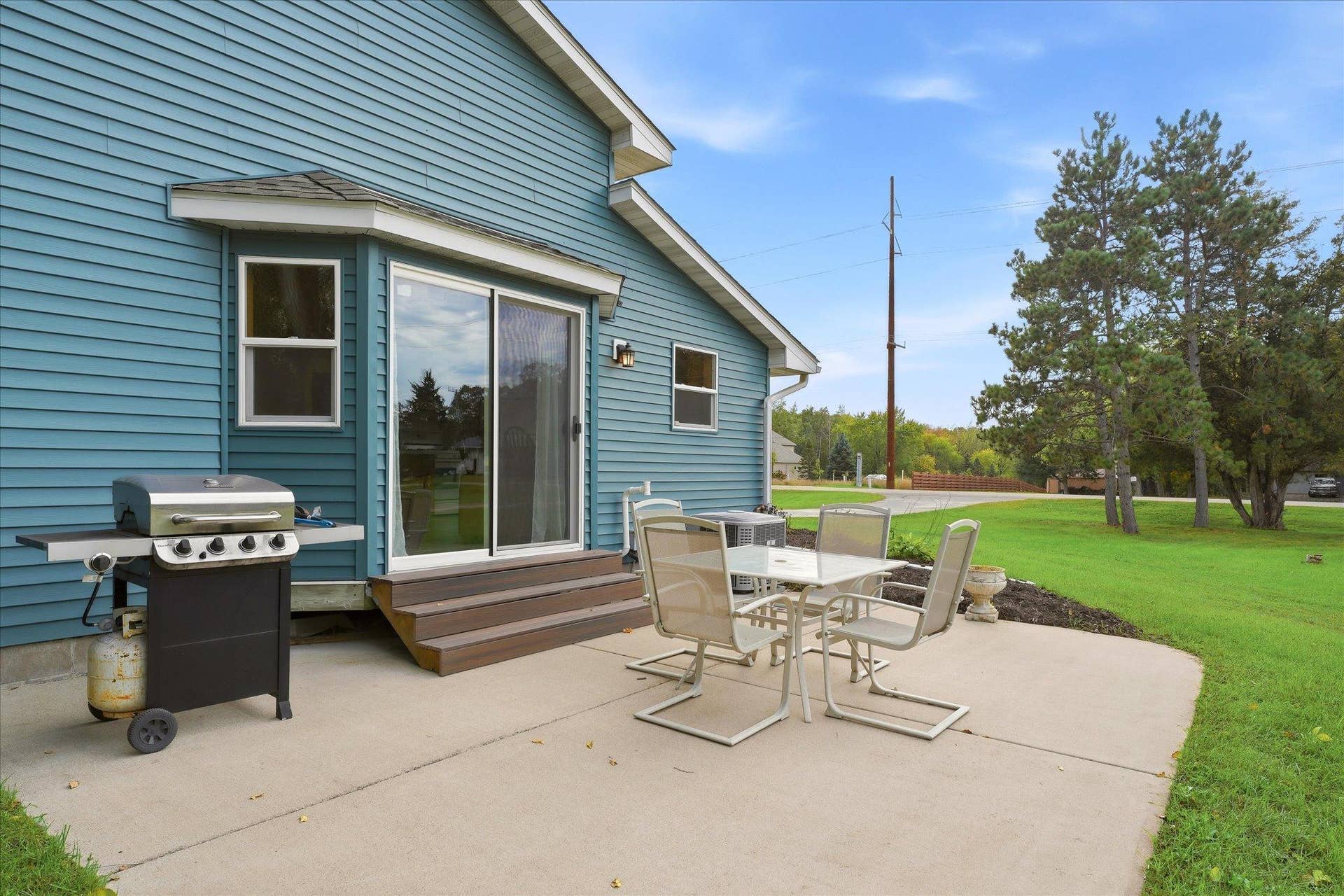 20720 187th Avenue NW, Big Lake, MN 55309 The spacious patio just off the dining room extends the living space outdoors, offering an ideal setting for grilling, dining, and entertaining.