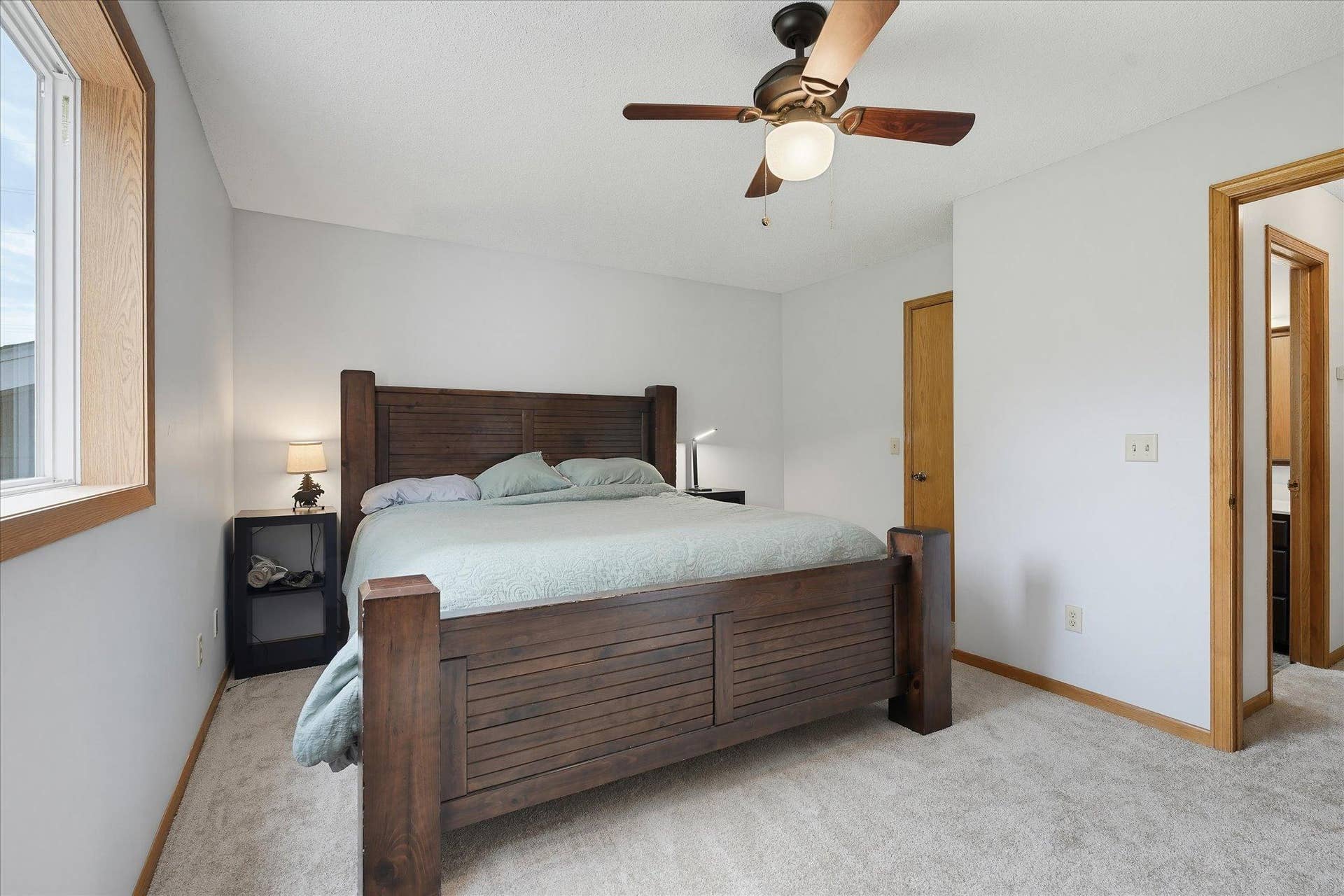 20720 187th Avenue NW, Big Lake, MN 55309 Primary bedroom offers convenient walk-through access to the full bathroom for added functionality.