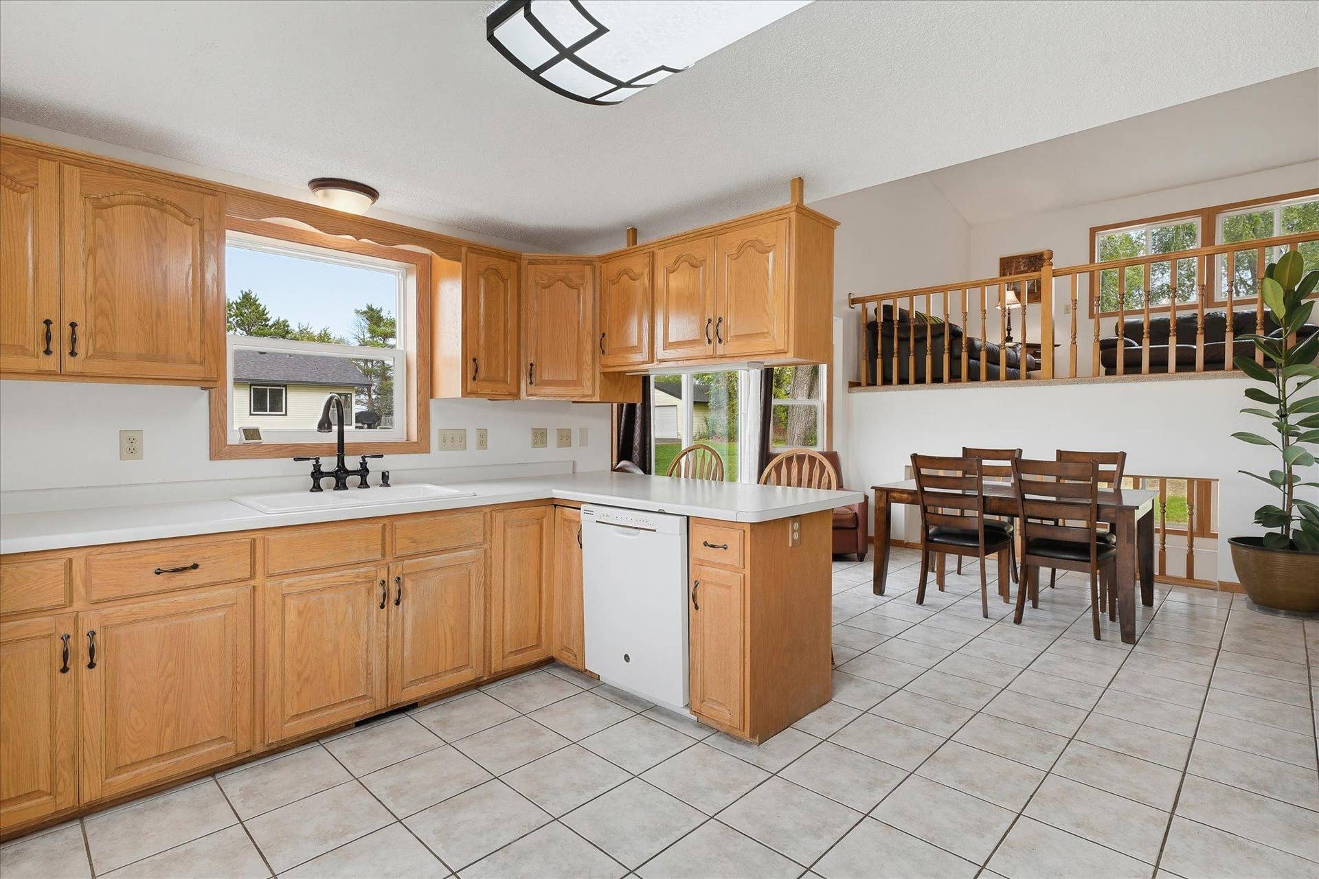 20720 187th Avenue NW, Big Lake, MN 55309 Peninsula provides additional workspace and casual seating while maintaining an open connection to the dining area.