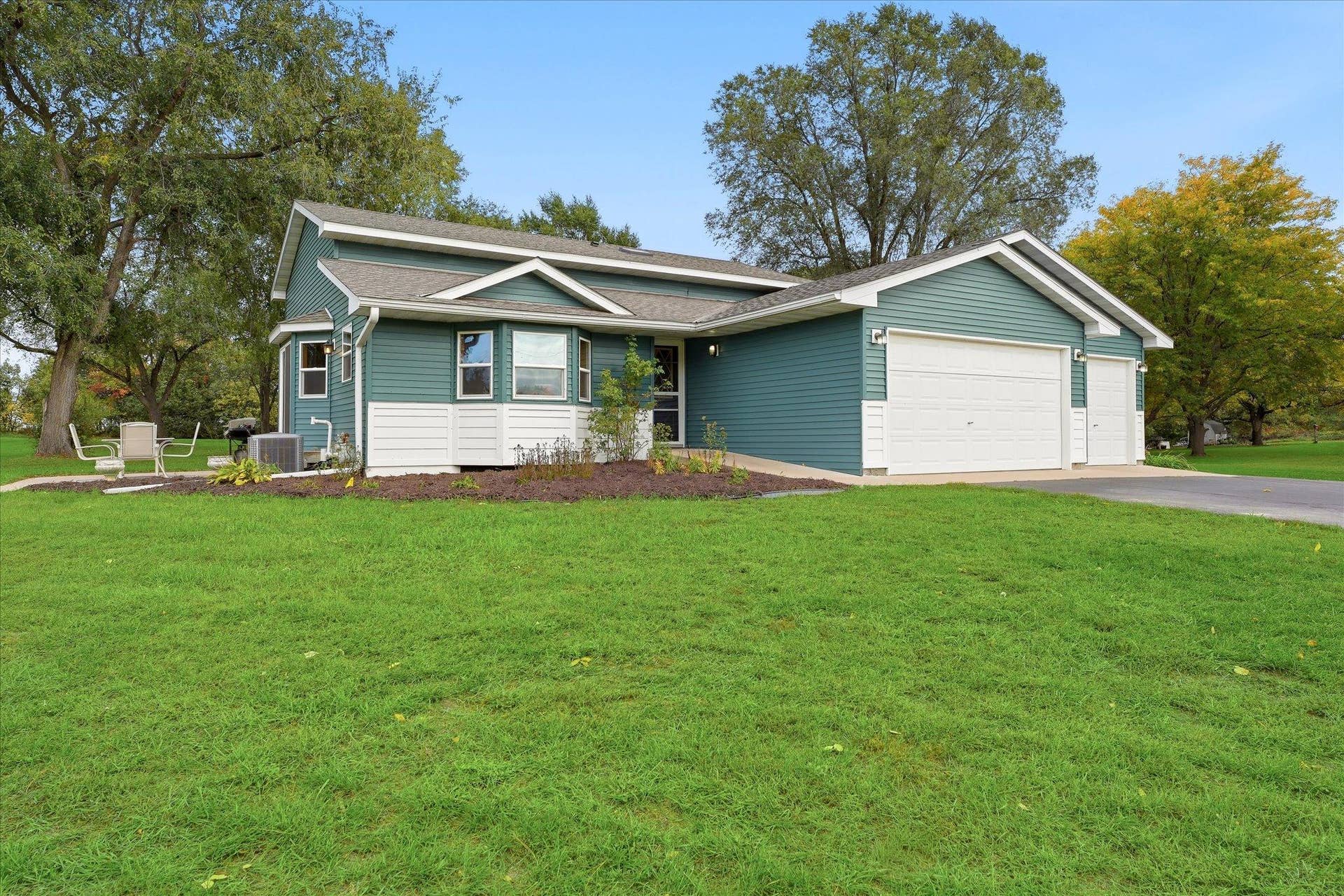20720 187th Avenue NW, Big Lake, MN 55309 Spacious yard surrounds the home, with a convenient patio area just off the side of the home.