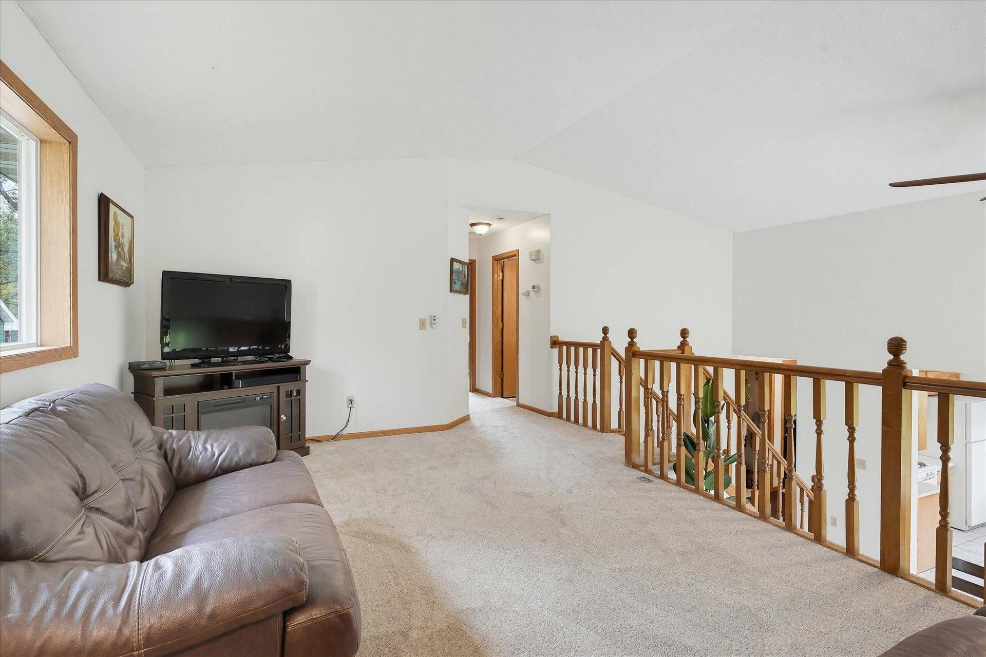 20720 187th Avenue NW, Big Lake, MN 55309 A second view shows the generous size of the living room with plenty of flexibility for multiple seating arrangements.