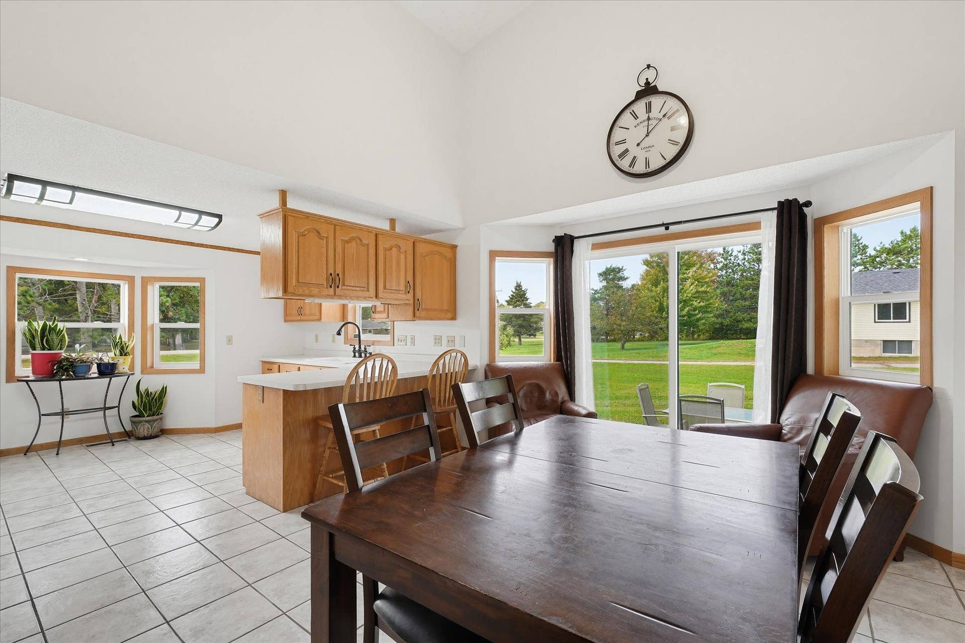 20720 187th Avenue NW, Big Lake, MN 55309 Open dining area flows seamlessly into the kitchen, with updated windows and patio access bringing in plenty of natural light.