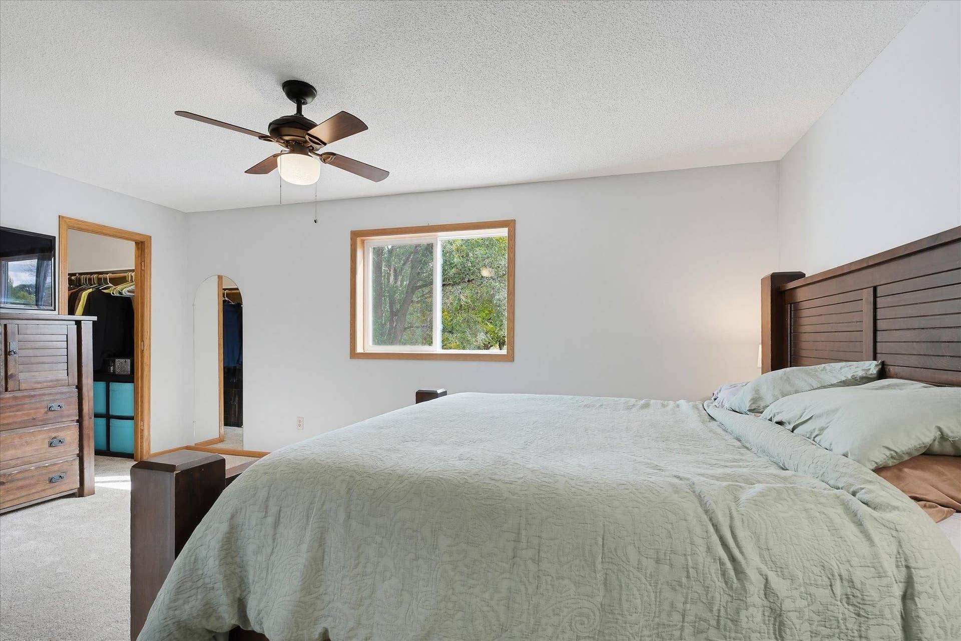 20720 187th Avenue NW, Big Lake, MN 55309 Comfortable primary suite includes a large walk-in closet and plenty of space for additional bedroom furniture.