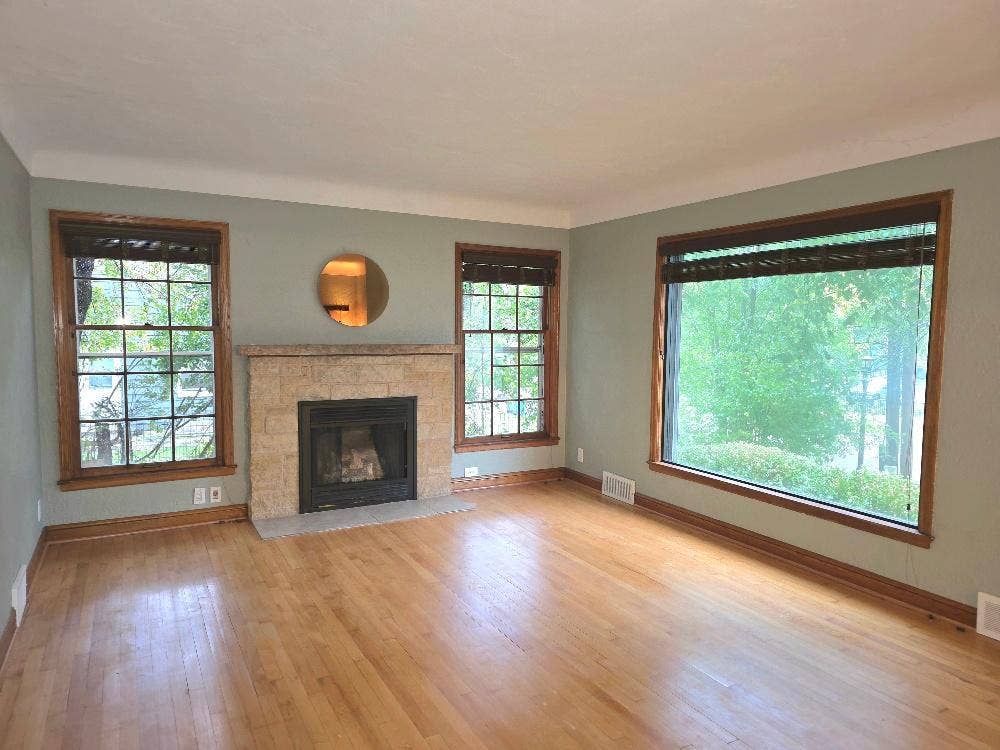 Living room future tv can be mounted in place of the mirror that hides the outlet