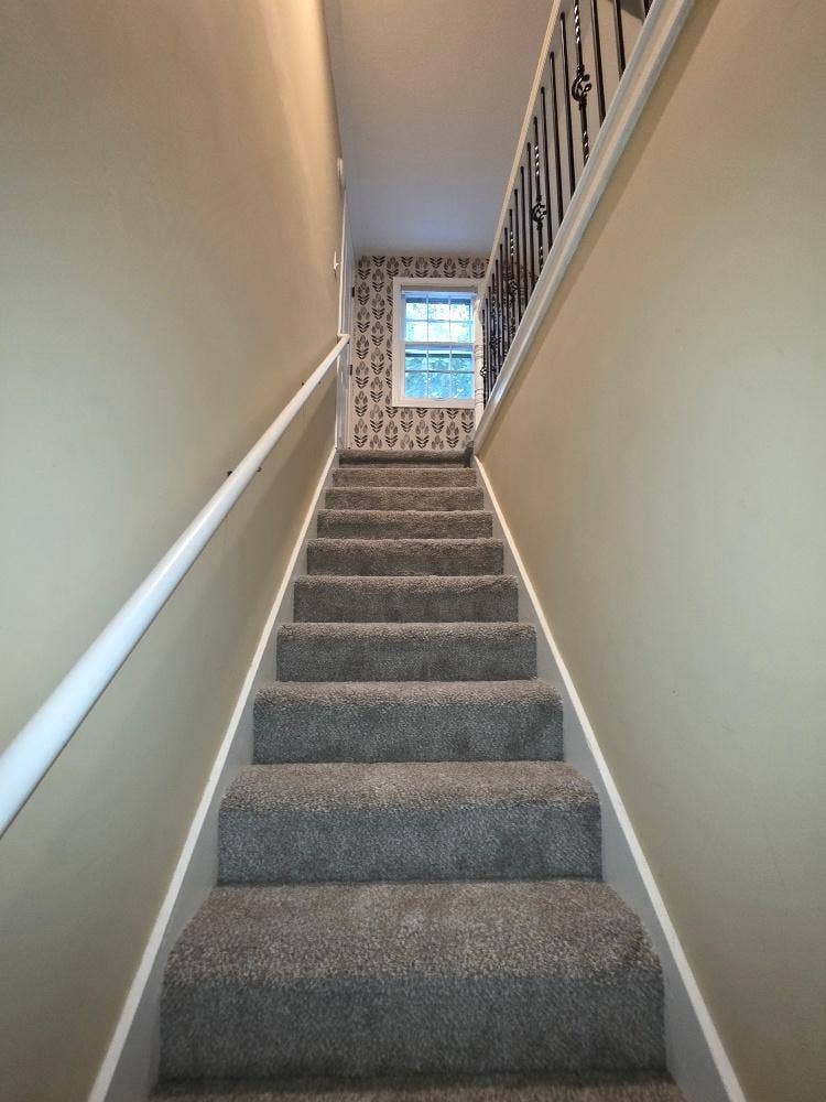 Upstairs to primary bedroom