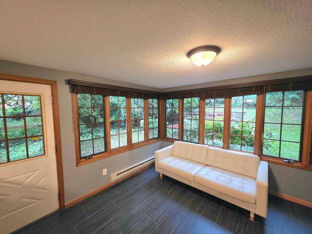 Sunroom with updated tile flooring