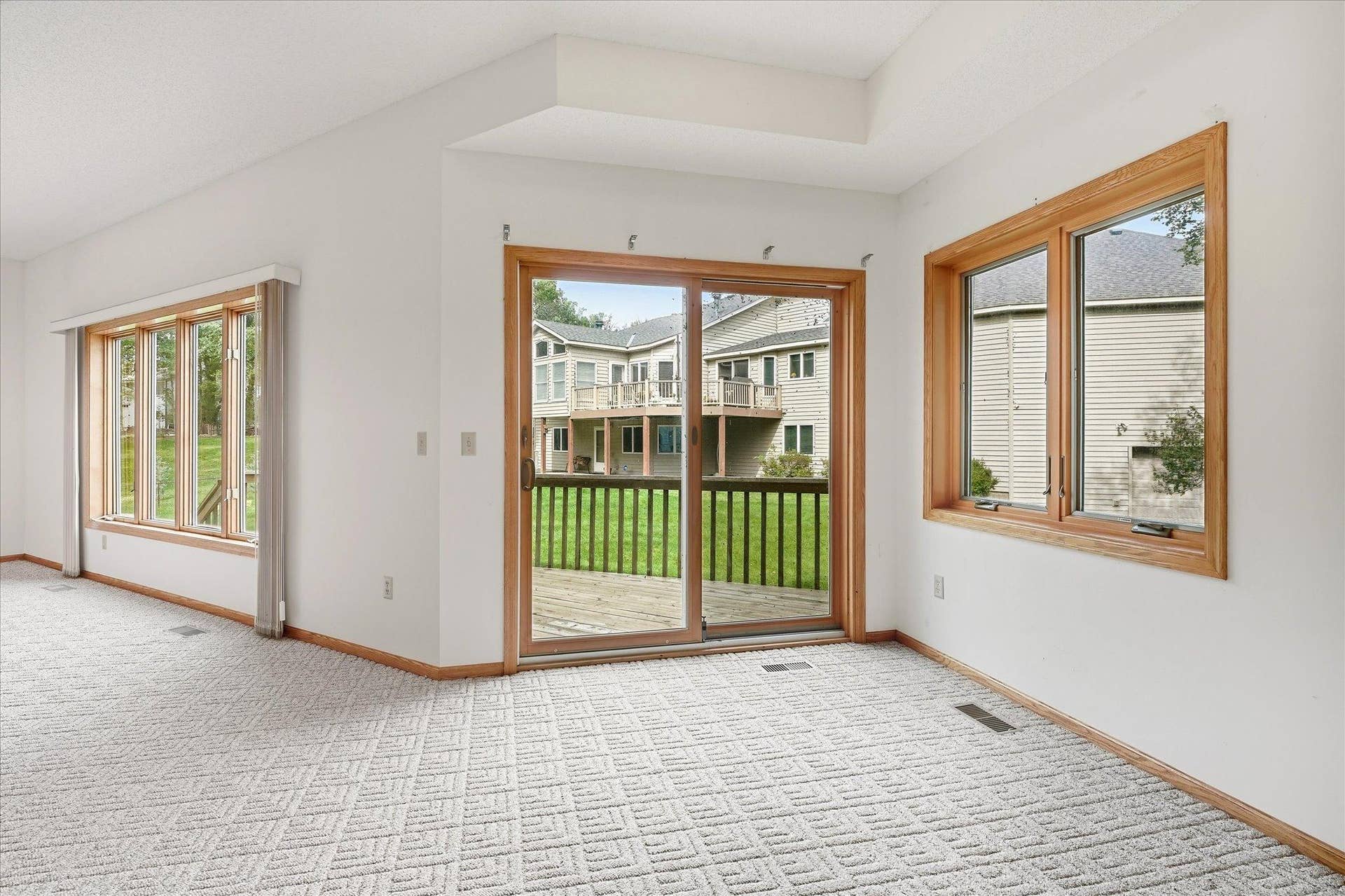 Walk out to the lower-level deck and enjoy seamless access to outdoor living and entertaining!