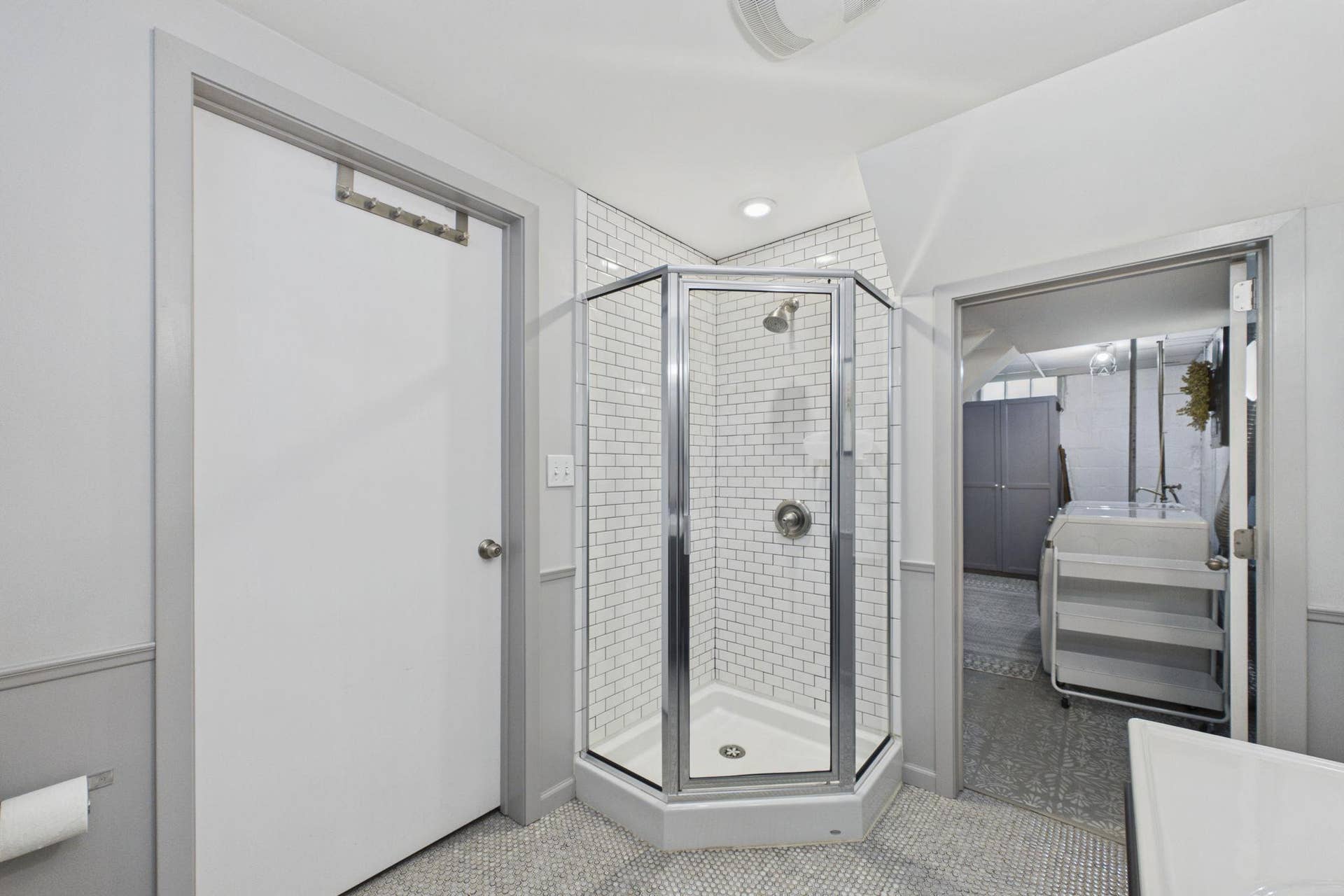 5115 Bloomington Avenue, 29, Minneapolis, MN 55417 The lower level bathroom has a tiled shower. The doorway is another entrance to the utility room.