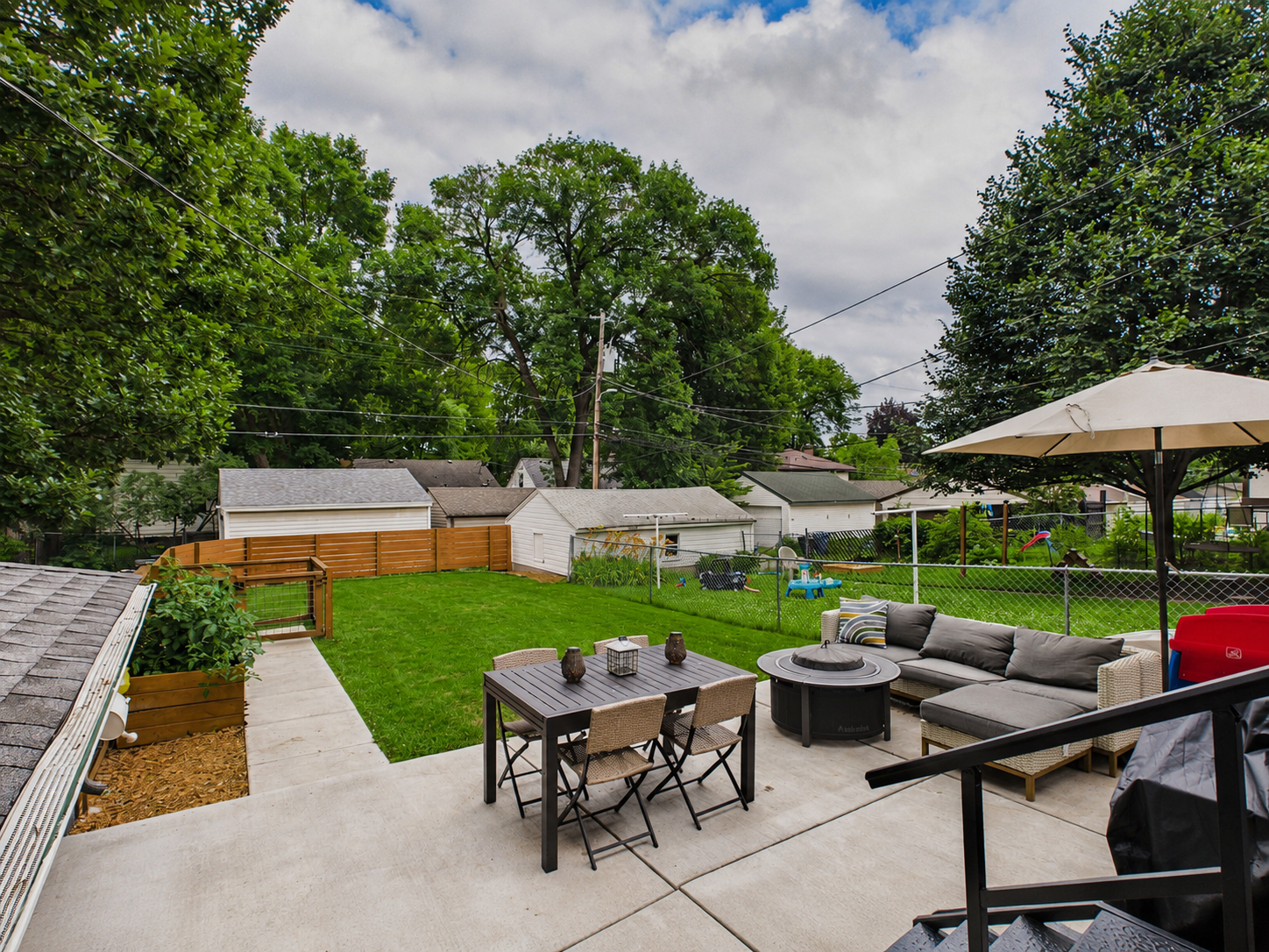 5115 Bloomington Avenue, 29, Minneapolis, MN 55417 The back yard patio is the perrfect spot for entertaining or relaxing. The whole yard is fenced and there is a raised garden box too! The tomatoes and peppers are ready!