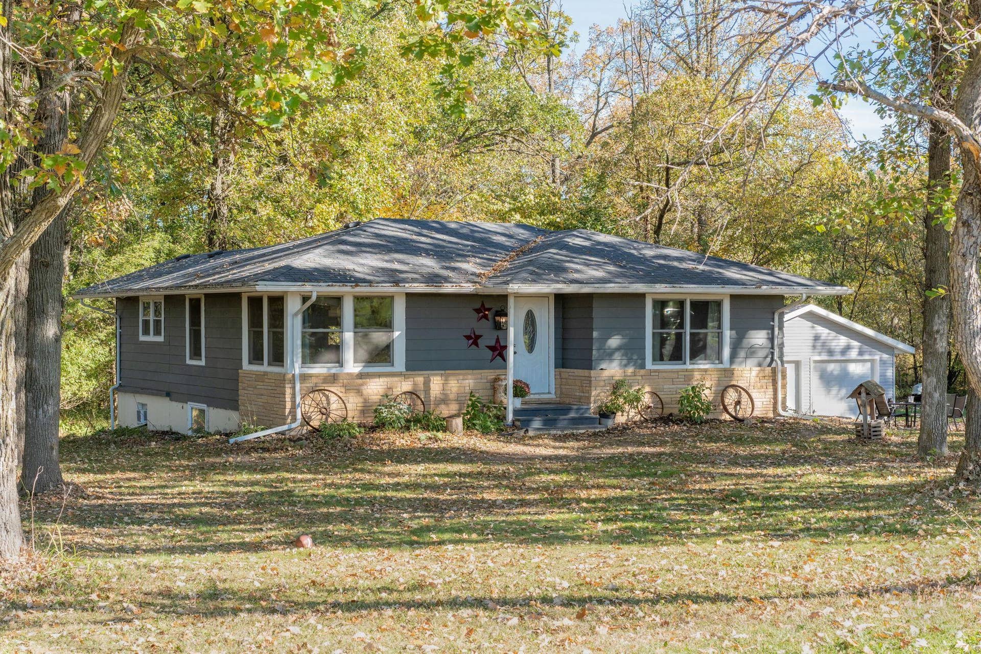 465 70th Avenue, Clayton, WI 54004 Welcome home! Set on approximately one acre surrounded by mature trees, this home offers space, privacy and a peaceful country setting.