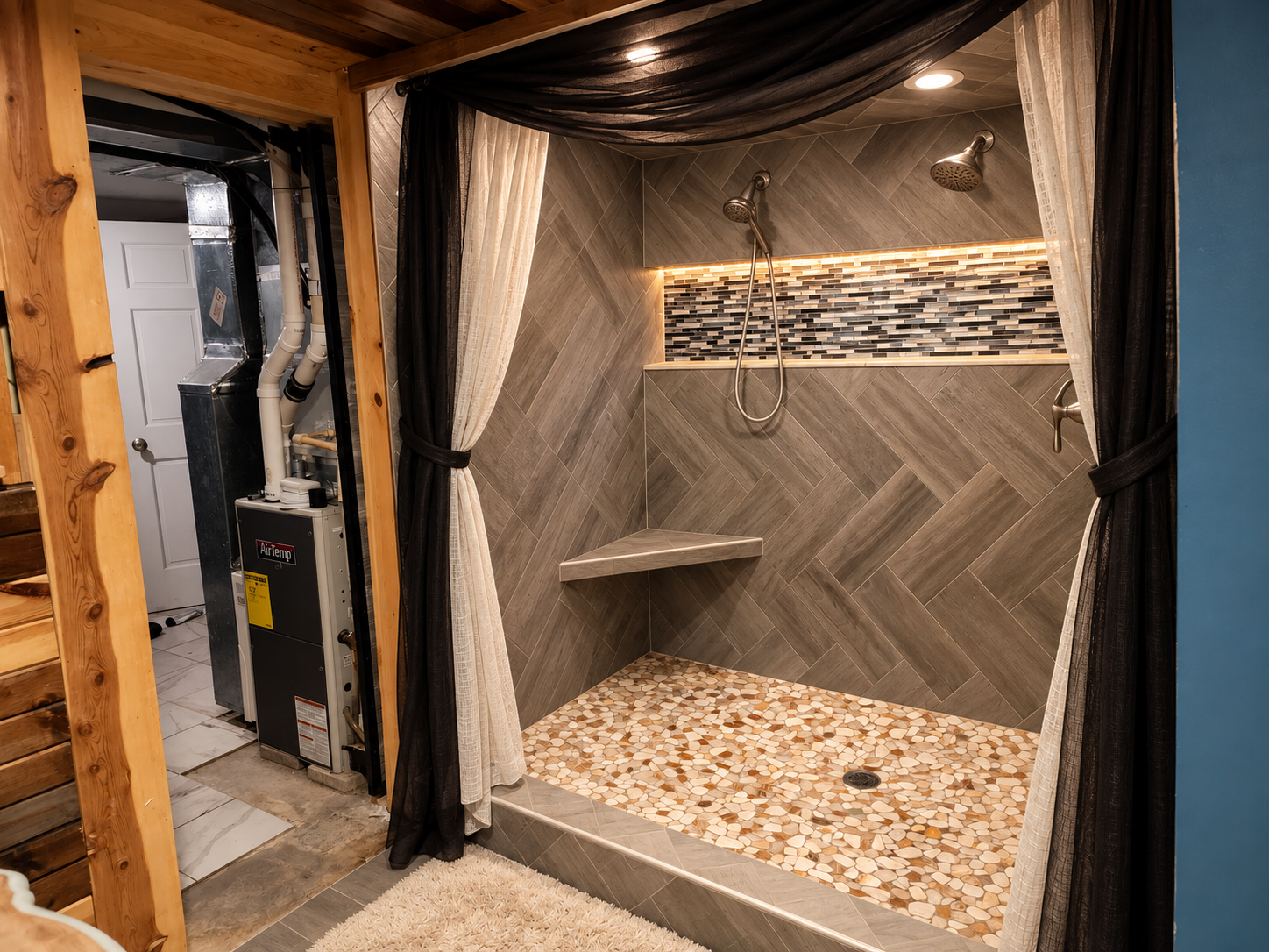 465 70th Avenue, Clayton, WI 54004 A standout primary ensuite featuring a spacious walk-in shower with dual shower heads, herringbone tile, built-in bench, pebble tile floor and illuminated mosaic accent niche.