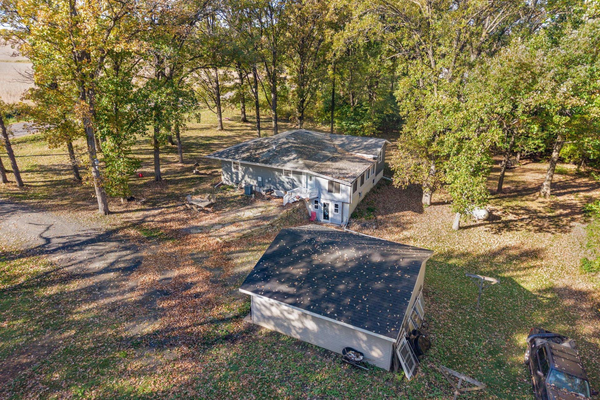 465 70th Avenue, Clayton, WI 54004 From above, you can really appreciate the setting: approximately one acre, mature trees, a detached garage and plenty of outdoor space to enjoy.
