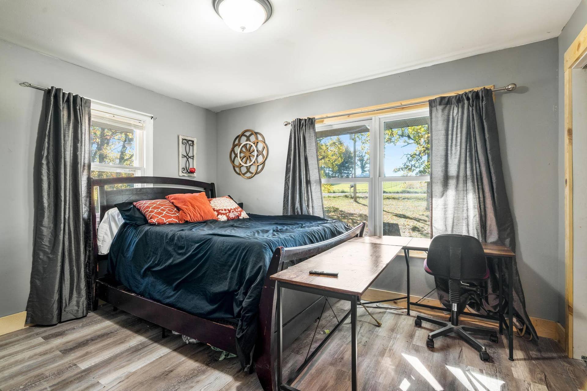 465 70th Avenue, Clayton, WI 54004 Generous bedroom space with multiple windows providing great natural light and views of the property.