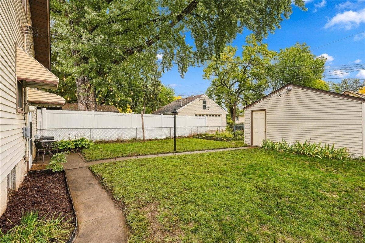 Your own slice of the city: a fully fenced backyard with established garden beds, green space and room to enjoy the outdoors.
