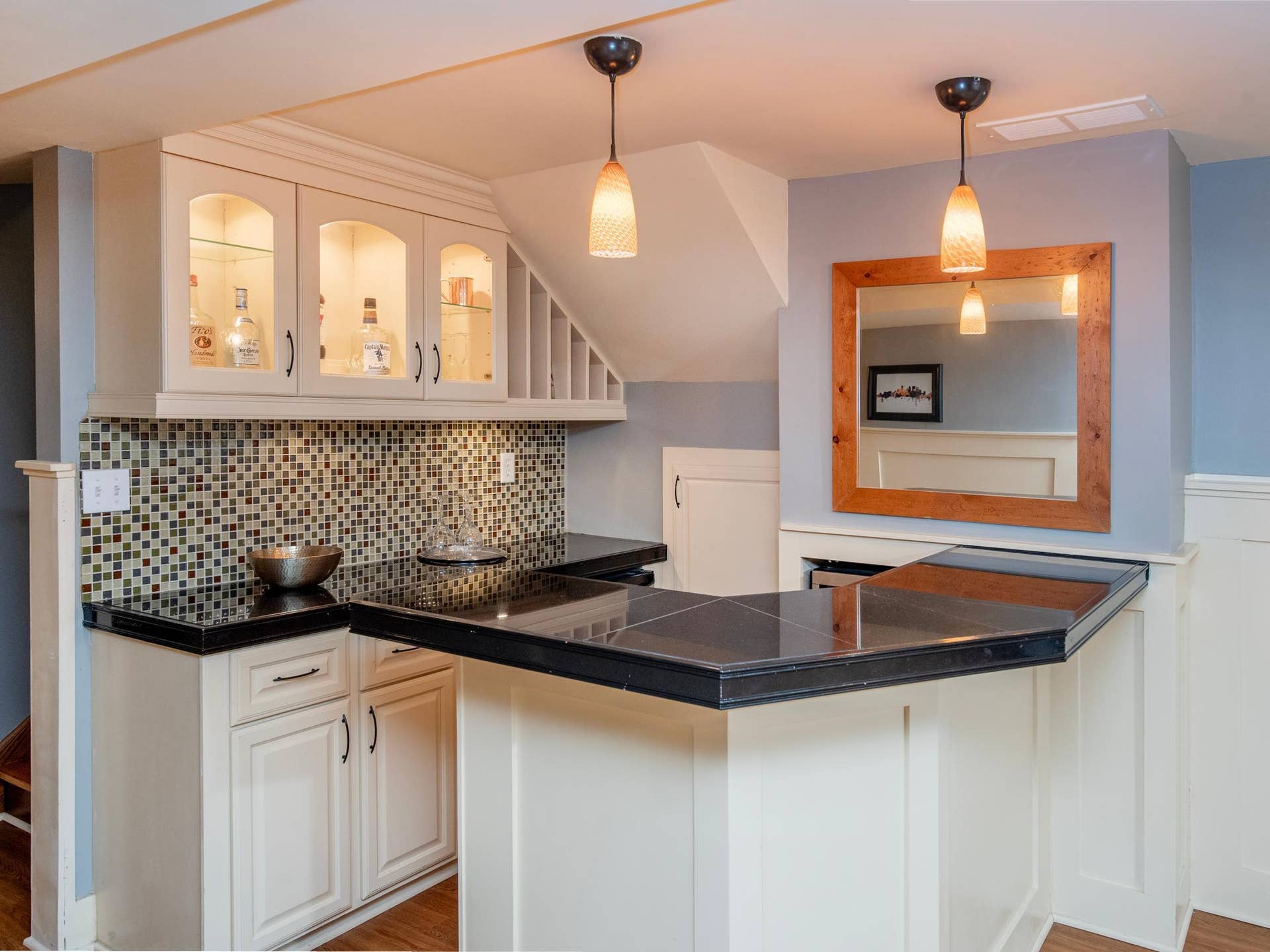 1492 Red Cedar Road, Eagan, MN 55121 A stylish lower-level bar creates the perfect setting for entertaining, relaxing and gathering with friends and family.