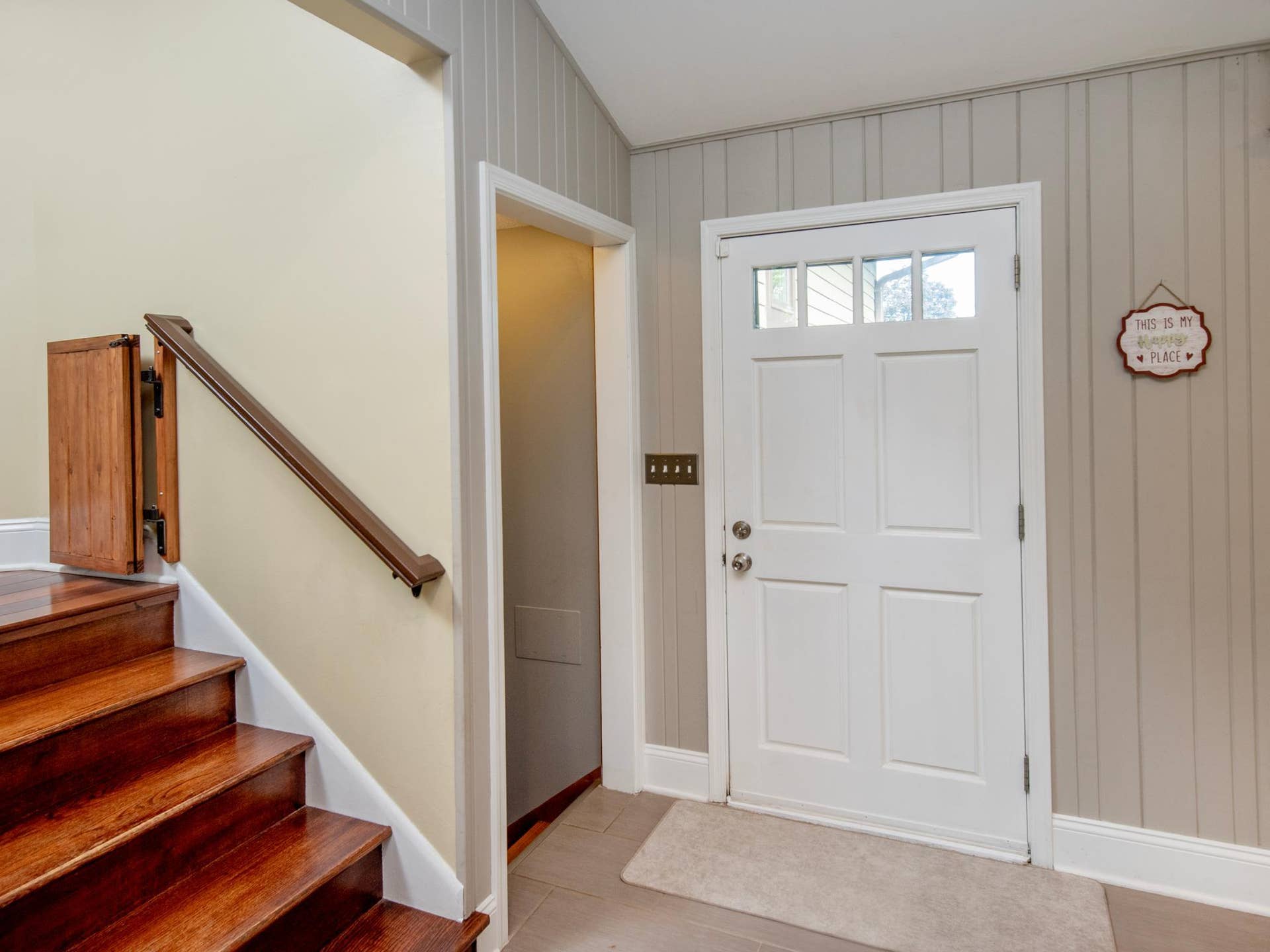 1492 Red Cedar Road, Eagan, MN 55121 Looking back at the inviting foyer which welcomes you with tile flooring and charming wainscoting.