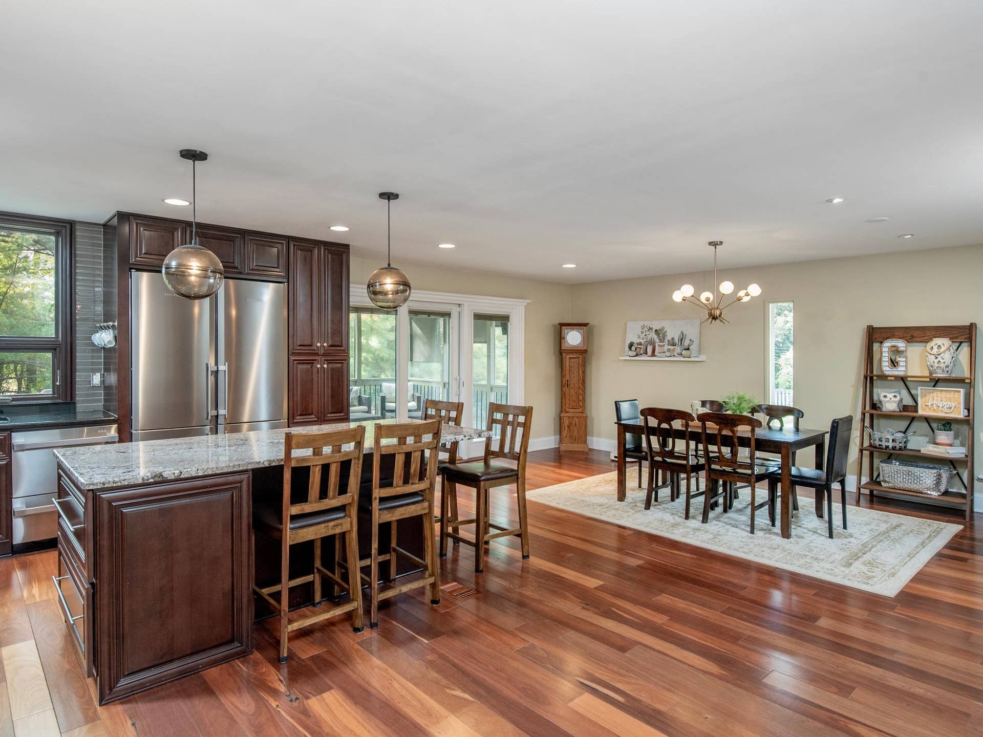 1492 Red Cedar Road, Eagan, MN 55121 Perfect for entertaining, the kitchen and dining room flow seamlessly together to create a warm and connected gathering space.