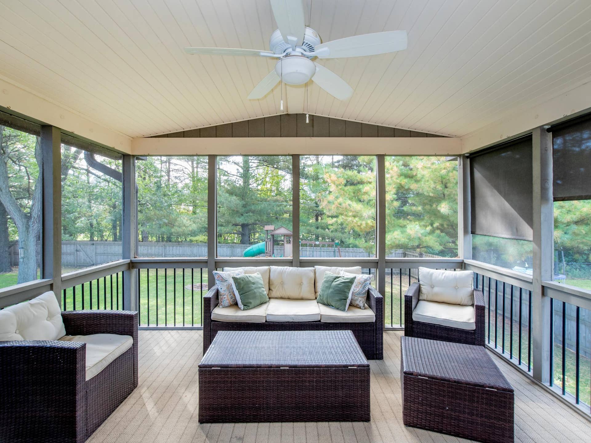 1492 Red Cedar Road, Eagan, MN 55121 A stunning three-season porch offers a peaceful retreat with beautiful views of the private backyard.