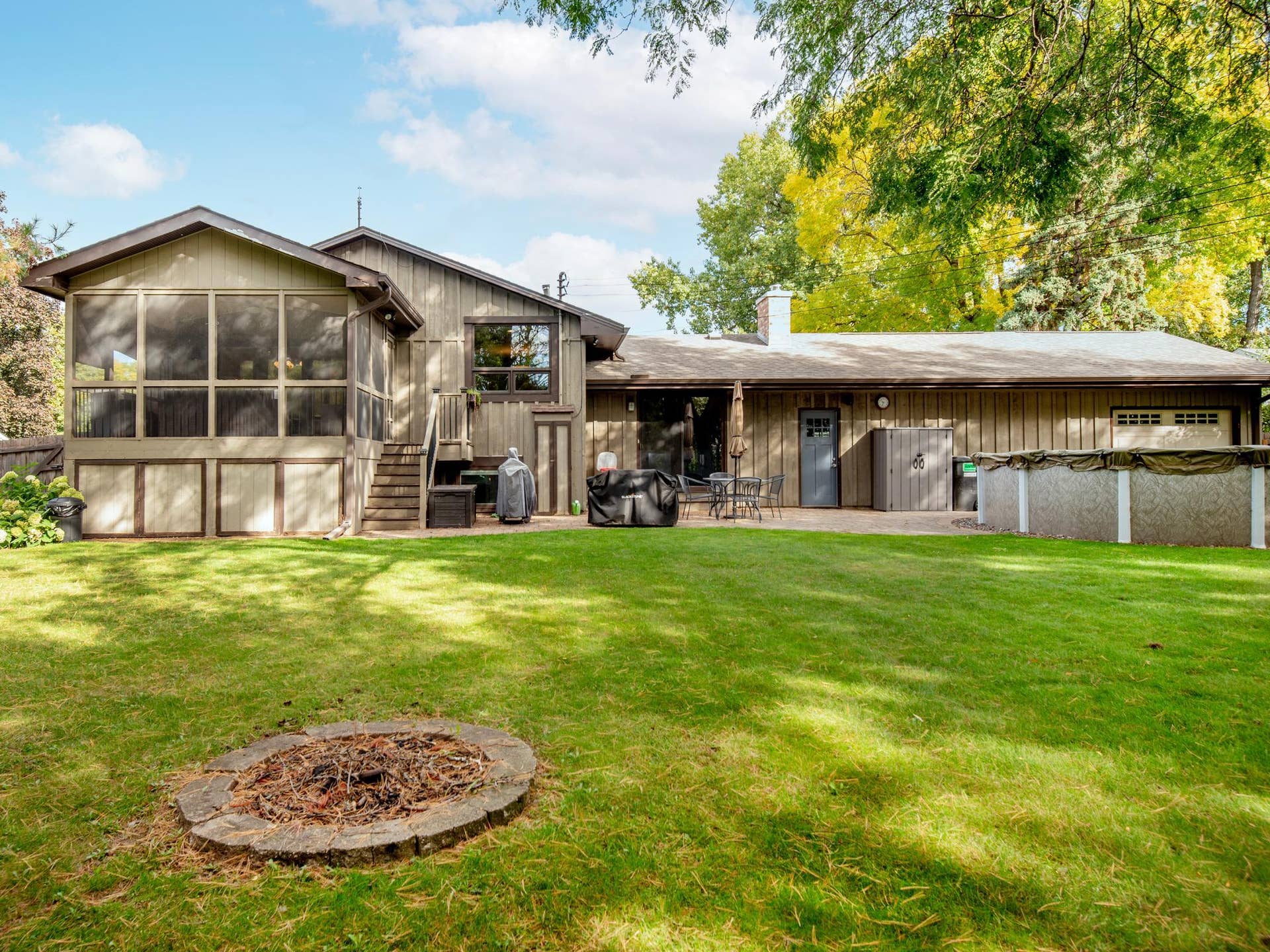 1492 Red Cedar Road, Eagan, MN 55121 A double garage door provides convenient access from the third stall directly to the backyard..