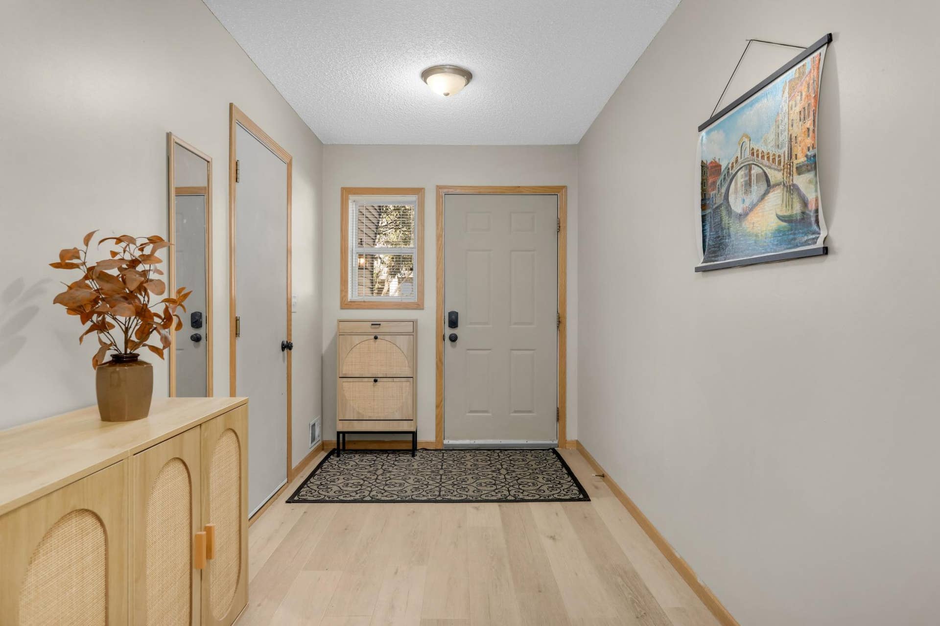 Bright entry foyer with new flooring