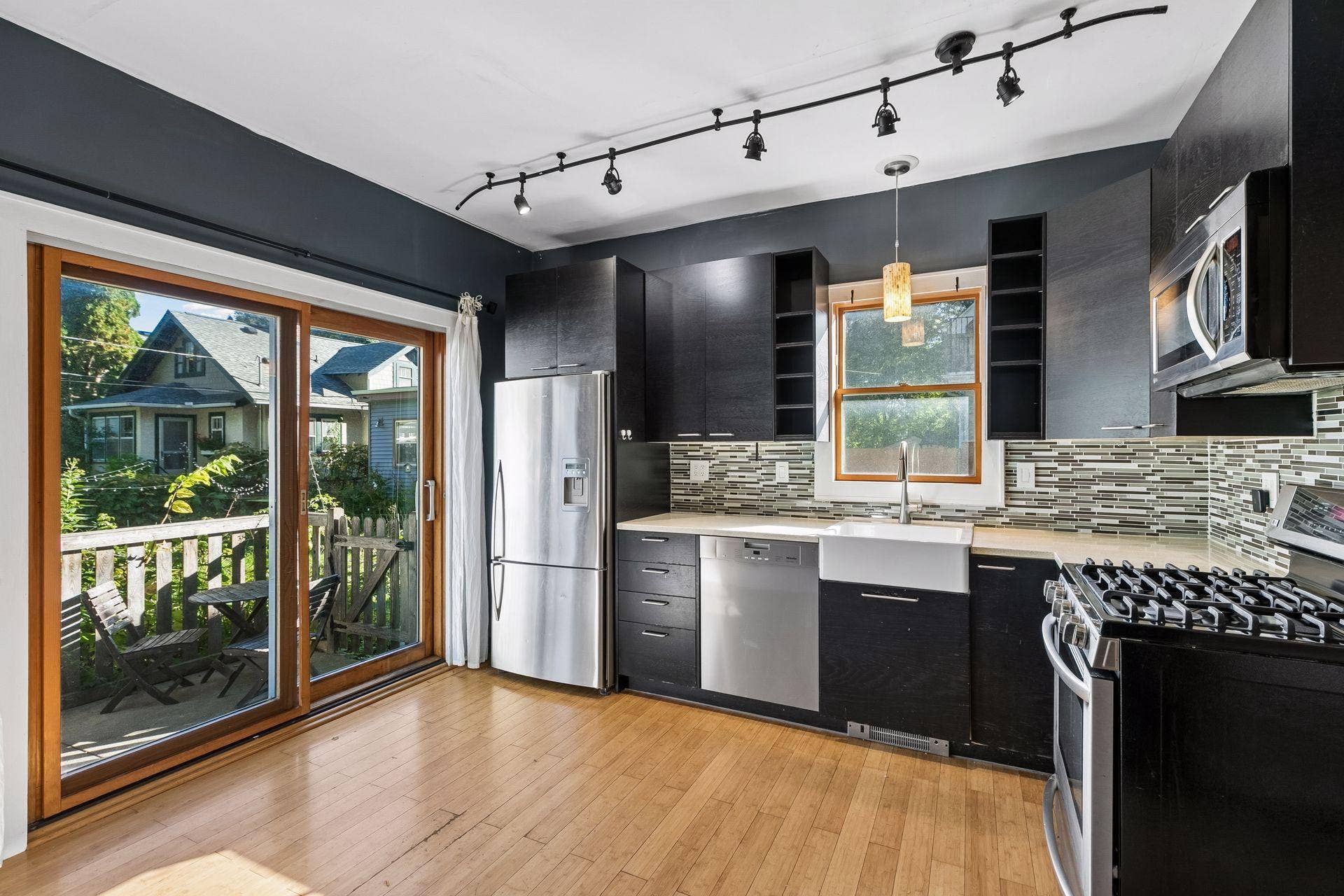 3112 E 33rd Street, 44, Minneapolis, MN 55406 With ample cabinet storage and easy access to the deck through the sliding doors, this kitchen makes everyday living and outdoor entertaining a breeze.