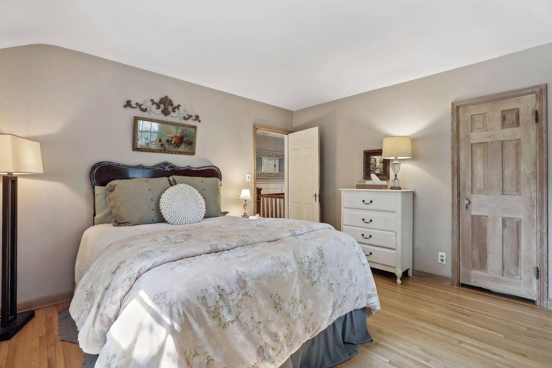 One of four upper-level bedrooms.