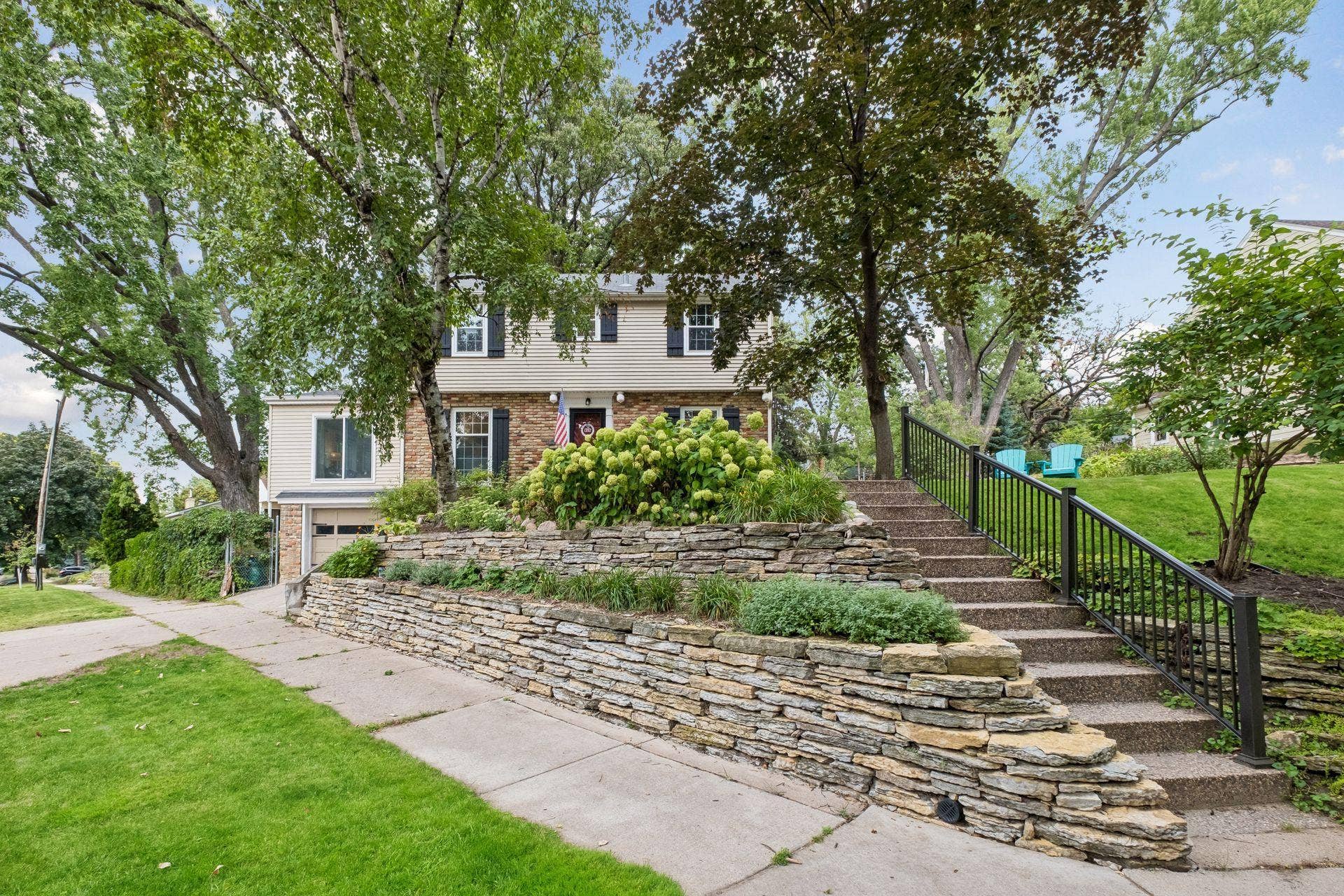Charming, new limestone terracing completed the gorgeous landscaping.  .