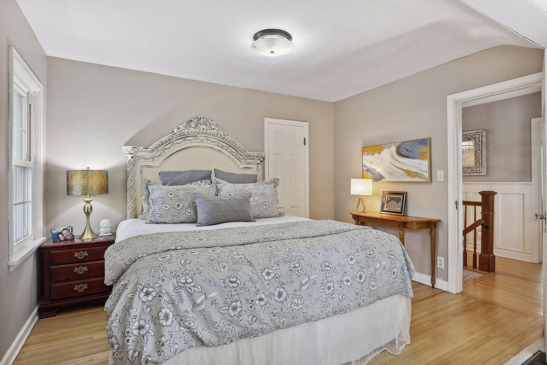 One of four upper-level bedrooms.